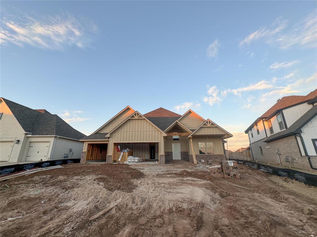 This Wesley Bonus Room floor plan includes 3,630 Sqft of total living space, which features 3,285 Sqft of indoor living space and 345 Sqft of outdoor living space. There is also a 590 Sqft, three-car garage with an in-ground storm shelter installed! This desirable home offers 5 bedrooms, 3 full bathrooms, covered patios, a large bonus room, a powder room, and a utility room featuring a utility sink. The great room supports an immaculate cathedral ceiling with a crows feet detail and a ceiling fan, a luxurious 3-panel sliding door with a 4’ back patio extension, wood-look tile, rocker switches throughout, Cat6 wiring, eggshell paint, and a center gas fireplace surrounded by our exquisite stacked stone detail. The upscale kitchen boasts stunning pendant lighting, stainless steel appliances including double ovens and a 5-burner cooktop, 3 CM countertops, vogue tile backsplash, well-crafted cabinets to the ceiling with cabinet hardware throughout and under cabinet lighting, decorative end panels, a separate walk-in pantry, and a large center island that holds a roomy sink, a dishwasher, and a trash can pullout. The primary suite provides a sloped ceiling detail, a ceiling fan, a plush carpet finish, and windows. Attached is the main bath, which has a bat-winged vanity with framed mirrors, 3 CM countertops, a large European walk-in shower, a private water closet with an elongated toilet, a free-standing tub, and a HUGE walk-in closet! The covered outdoor living area welcomes a wood-burning fireplace, a gas line for your grill, and a handy TV hookup. Other included features for this elegant home include our healthy home technology, an air filtration system, a tankless water heater, double glazed vinyl low E windows with argon, R-44 and R-15 insulation, a fresh air ventilation system, and so much more!