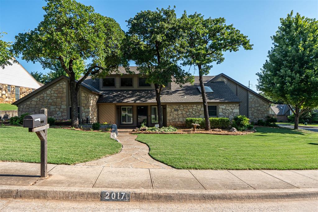 Nestled in the heart of southeast Edmond, this updated home is a unique opportunity. The great room, dining and remodeled kitchen offer open space for comfortable living. The primary suite has a luxurious bathroom with dual vanities, separate shower and tub, two walk-in closets and a private entrance to the pool. The two secondary bedrooms are a nice size with ample closet space. The half bath near the living areas is great for guests, and an extra room could be used as an office, craft room or playroom. The home also features outdoor living at its finest, with a covered patio and a heated salt water pool and spa that can be used almost year-round. The three car garage is a rare find in the neighborhood, and the house provides a lot of storage inside too. With new carpet, fresh paint, and updated fixtures this home is move-in ready and could be decorated with a classic or modern style.