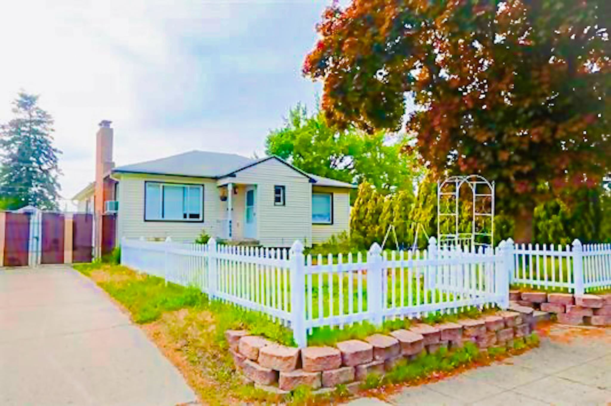 Nestled in the heart of Shadle, Spokane, this beautifully updated 3- bedroom, 2-bathroom home offers the perfect blend of modern comfort and classic charm.  Imagine cozy evenings by the fireplace in the spacious living room, family gatherings in the updated kitchen with modern appliances, and summer barbecues in the expansive backyard.  The kids will love the large bedrooms and the convenience of nearby parks and schools. You'll appreciate the detached garage, the easy access to shopping, and all that Spokane offers.  With modern colors, finishes, and appliances throughout, this home is move-in ready.  At this price, it won't last long! Schedule a showing today and experience the warmth and comfort of this inviting Shadle gem.