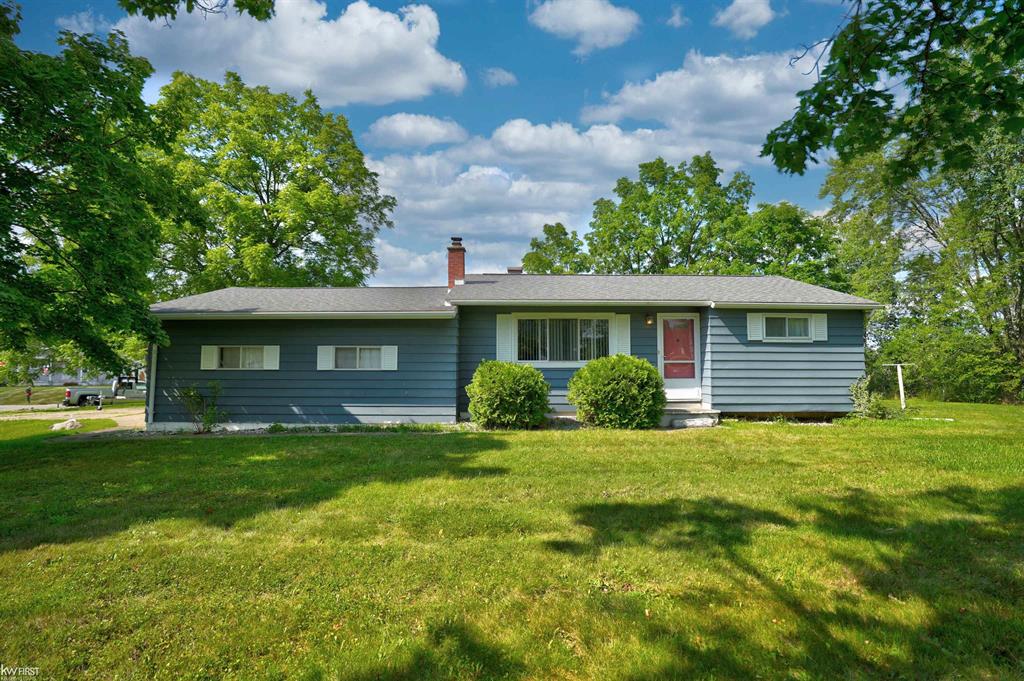 Welcome to this lovingly maintained one-owner home, nestled on a spacious corner lot in the desirable Vassar Park subdivision-and now available for the very first time! Offering 3 bedrooms, 1.5 bathrooms, and 1,176 sq. ft. of main level living space, this home has been thoughtfully cared for over the years and is full of charm and potential. The inviting layout includes new flooring in the living room, creating a fresh and welcoming space. You'll love the partially finished basement, perfect for extra living space, hobbies, or storage, and the roomy 2.5-car attached garage provides plenty of space for vehicles and tools. Sitting on a generous half-acre lot, the yard offers lots of room to roam, a shed for added storage of outdoor items, and the large covered back deck is ideal for enjoying morning coffee, outdoor dinners, or peaceful evenings under the stars. Additional updates include a new water heater (July 2025), giving you peace of mind for years to come. Don't miss your opportunity to own this gem in a small established subdivision. Schedule your showing today and imagine the memories you'll make here!