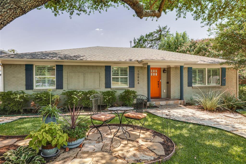Welcome to Caprock Circle—Lochwood living at its finest!

From the moment you spot the cheerful tangerine front door, this home radiates charm. Nestled on one of the most sought-after streets in the neighborhood, this beautifully updated pier-and-beam residence combines timeless character with today’s modern conveniences.
Step inside to gleaming oak hardwood floors, a bright and open layout with two spacious living areas, a formal dining room, and a kitchen designed for both style and function. The apron-front sink, gas range, and seamless flow into the family room create the perfect space for entertaining.

The primary suite offers a spa-inspired retreat with a frameless glass shower and designer tile, while the guest bath shines with its floating vanity and chic finishes. A flexible bonus space at the back of the home is ready to serve as your office, gym, or playroom.

Outdoor living is a highlight here—relax in the shady backyard with turf, multiple seating areas, and plenty of room for gathering with friends.