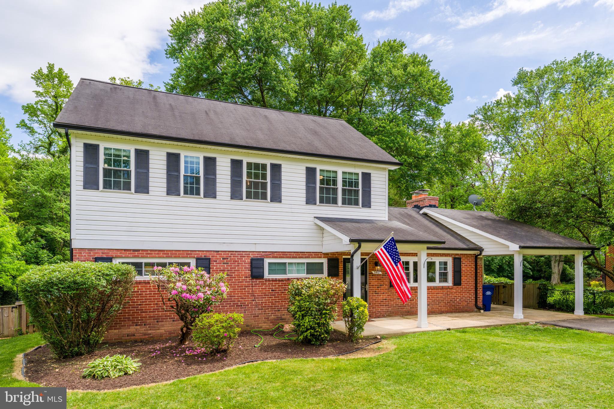 Set on a fenced lot of nearly half an acre in the heart of Mount Vernon, this 5 bedroom, 3.5 bath home offers the kind of space, comfort, and layout that simply makes life feel easier. Hardwood floors run throughout the home, and the main level was designed for the way people actually live, with open sightlines between the kitchen, dining room, and family room. The family room is especially memorable with its soaring cathedral ceilings and striking stone fireplace that naturally draws everyone in, whether it is a quiet evening at home or a house full of friends and family. The kitchen is generously sized and thoughtfully designed with maple shaker cabinetry, granite countertops, stainless steel appliances, an eat in bar, and an impressive amount of storage. The oversized foyer creates a welcoming entry, while the expansive laundry and storage area adds everyday practicality that is hard to find. Upstairs, the primary suite feels calm and private with an updated bath featuring dual vanities, a soaking tub, and walk in shower, and the additional baths throughout the home have all been beautifully updated as well. Outside, the freshly refinished deck overlooks a backyard with endless possibilities, from soccer games and summer cookouts to gardening, pets, or simply enjoying a little extra room to breathe. Located just minutes from Riverside Elementary, Whitman Middle School, Mount Vernon High School, the George Washington Recreation Center, parks along the Potomac, neighborhood shopping and dining, and commuter routes to Old Town, Fort Belvoir, the Pentagon, and Washington, DC, this home offers a rare combination of space, warmth, and convenience in one of Northern Virginia’s most established communities with no HOA!