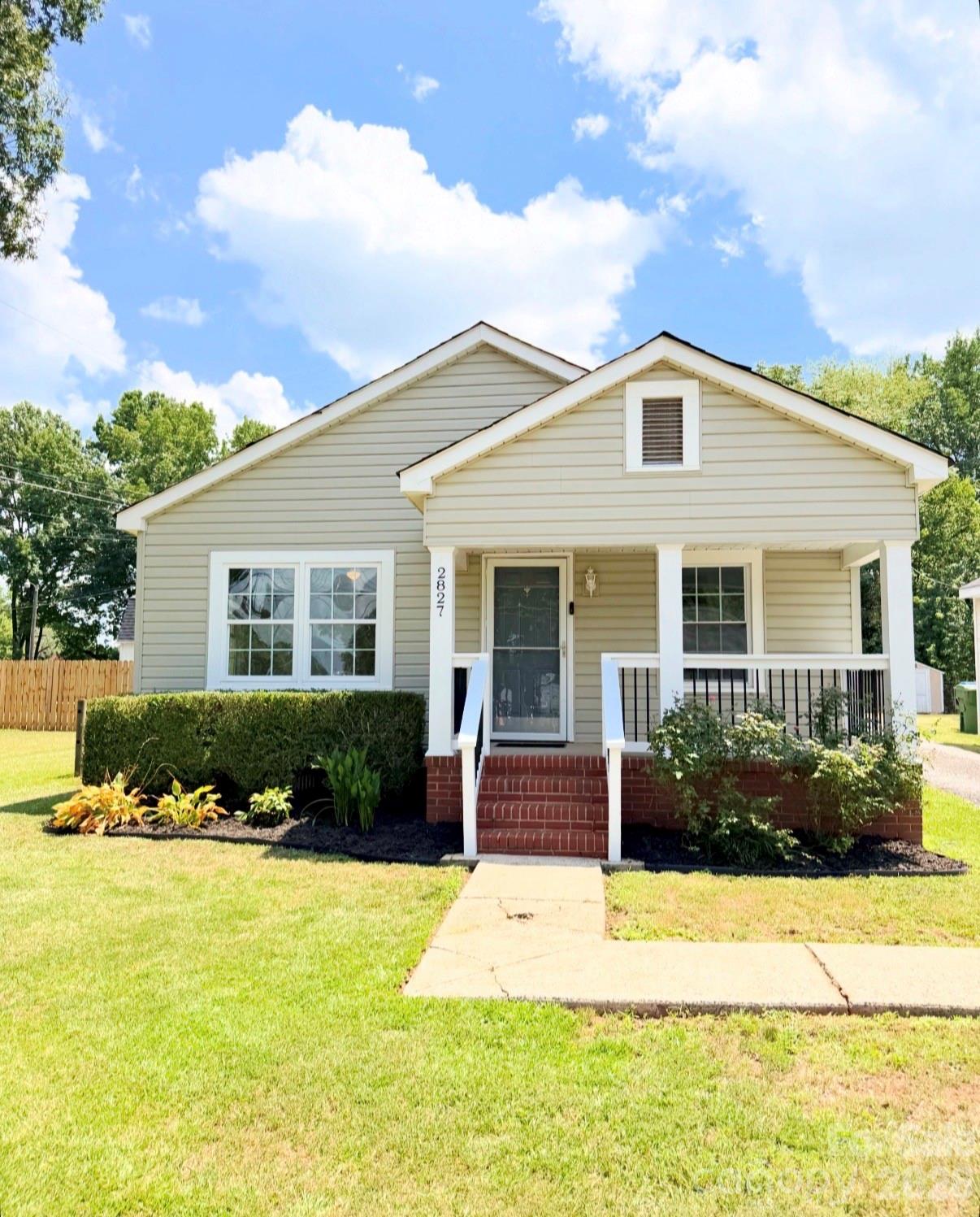 Welcome home to this beautifully renovated 2-bedroom, 1-bath gem nestled in the heart of Ranlo! From the moment you arrive, you’ll fall in love with the inviting rocking chair front porch- the perfect place to enjoy your morning coffee or unwind after a long day. Step inside to discover a fresh, updated interior with open floor plan that’s completely move-in ready, offering modern finishes while maintaining all the charm that makes a house feel like home. One of the standout features of this property is the versatile detached building with mini split system in the backyard! Whether you’ve been dreaming of a man cave, she shed, home office, creative studio, gym, or the ultimate hangout space, the possibilities are endless. This adorable home is the perfect opportunity for first-time buyers, those looking to downsize, or anyone searching for a turnkey property with extra space to make their own!