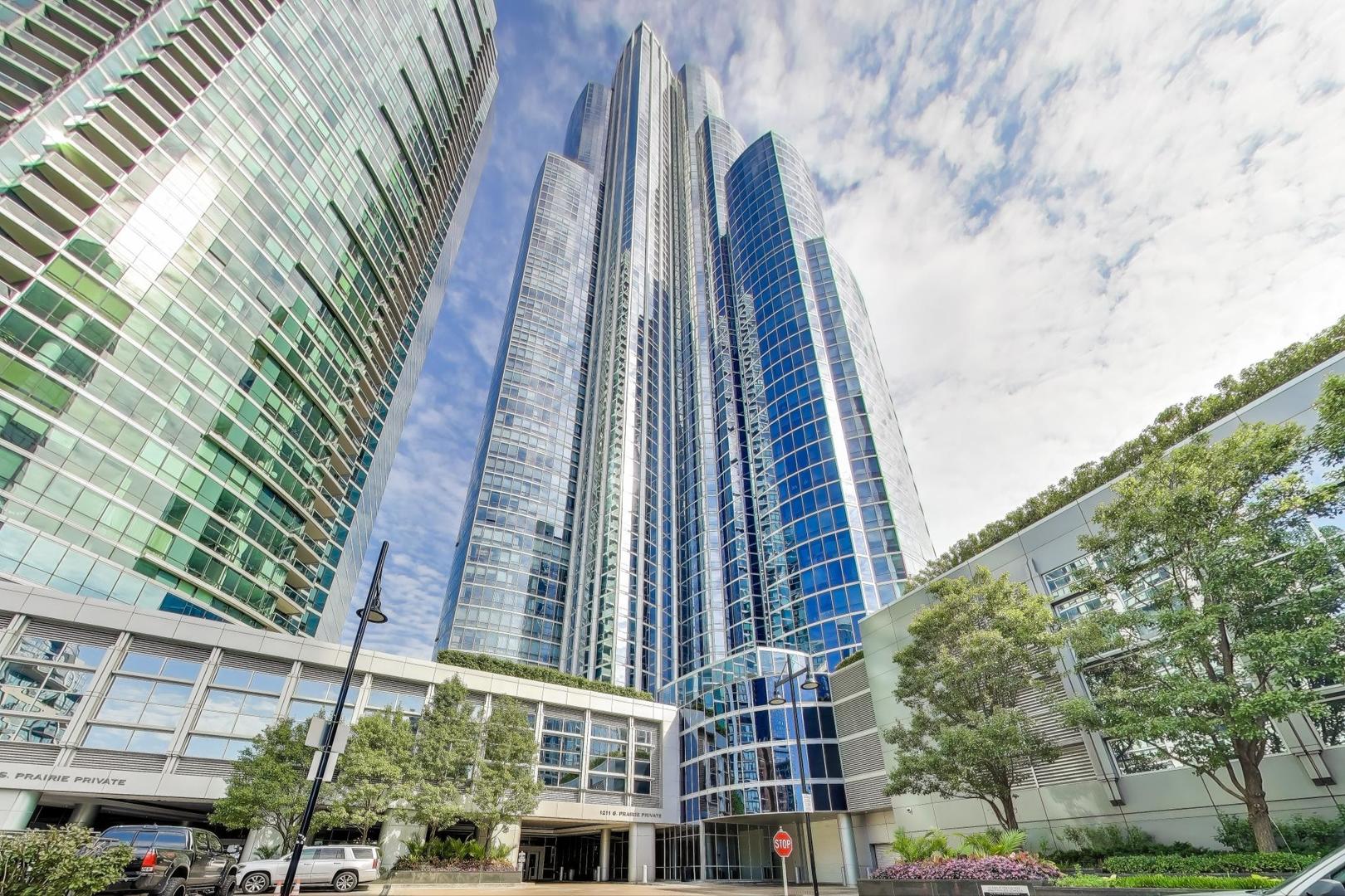 Wake up to Sunrise and Lake views! Highly sought after East & North facing 2 Bedroom, 2 Bathroom, plus Den and a balcony offers sweeping forever Lake Michigan & skyline VIEWS! Walk to Lake Michigan, Museum Campus, Sports, Grant park, Restaurants, Nightlife ...!  This home offers several closets (4 closets in master BR!) STUNNING by day! CAPTIVATING by night ! Granite counters, hardwood floors, marble baths ... and all the features you would expect in a flagship building ....... Full service full amenity building includes 24hr door staff, on site management, dry cleaner, grocery,  fitness center, 2 party rooms, indoor pool And outdoor pool, outdoor landscaped terrace and kitchens .... perfect for all your entertainment needs !! Highly coveted 2 parking additional ...Captivating protected views can be yours !!