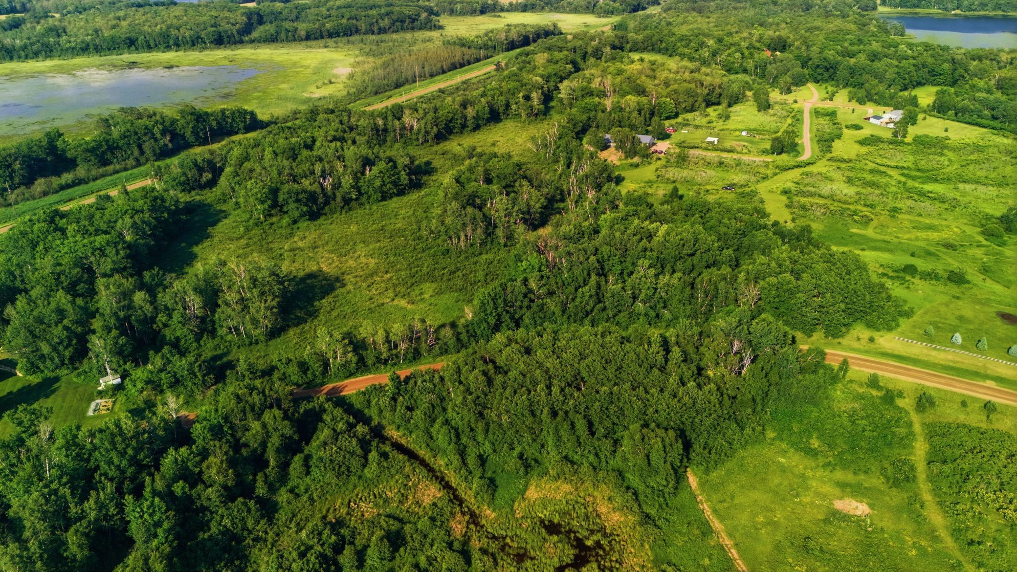 Discover 7.1 acres of beautiful Northwoods property offering a wonderful blend of mature trees and open space. Located near Spectacle Lake and Farm Island Lake, this scenic parcel provides an ideal setting to build your dream home, cabin, or weekend retreat. Enjoy privacy, abundant wildlife, and convenient access to nearby lakes, recreation, and all the outdoor activities the area has to offer.Buyers and agents to verify all measurements.