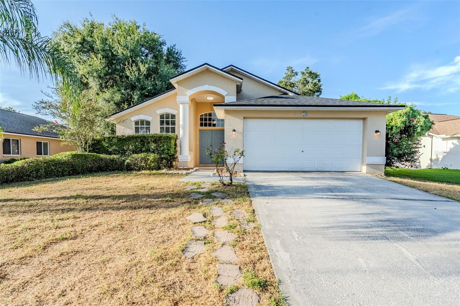 This beautifully updated home features full interior paint, new LVP flooring, new light fixtures, a new dishwasher, and a refreshed bathroom. Inside, the double-door entry opens to a spacious living room with vaulted ceilings, while the bright kitchen shines with white cabinets, quartz counters, stainless appliances, and a subway tile backsplash. Enjoy outdoor living on the screened-in back patio.
