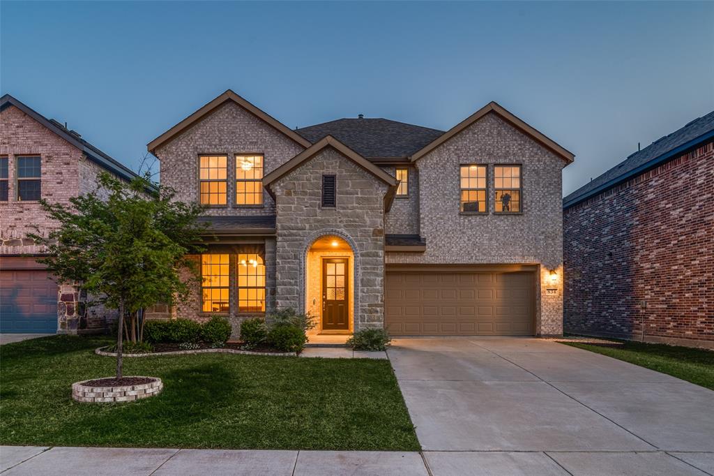 Stunning 3,627 sq. ft. home in Woodcreek, a master-planned community, and loaded with designer upgrades throughout. From the moment you step inside, wood-look tile flooring, custom accent walls, and high-end finishes set this home apart. The open-concept kitchen is a showstopper featuring a large quartz island, gas cooktop, white shaker cabinets, a custom vent hood, and a gorgeous hexagon tile backsplash. The living area flows seamlessly to the backyard through walls of windows. A French-door study and a dramatic formal dining room with custom 3D wall paneling add versatile flex spaces.The first-floor primary suite offers a spa-like en-suite with a soaking tub, glass-enclosed walk-in shower, dual vanity, and a custom-built closet system. Upstairs, enjoy a massive game room, media room, three additional bedrooms, and two full baths. The backyard is an entertainer's dream. A custom deck and pergola with shade sails, a built-in mister system, string lights, a privacy wall, and a covered patio make this outdoor space truly one of a kind. Zoned for Royse City ISD. Woodcreek HOA includes three amenity centers with pools, fitness centers, outdoor kitchens, dog parks, playgrounds, a soccer field, a putting green, and scenic ponds.