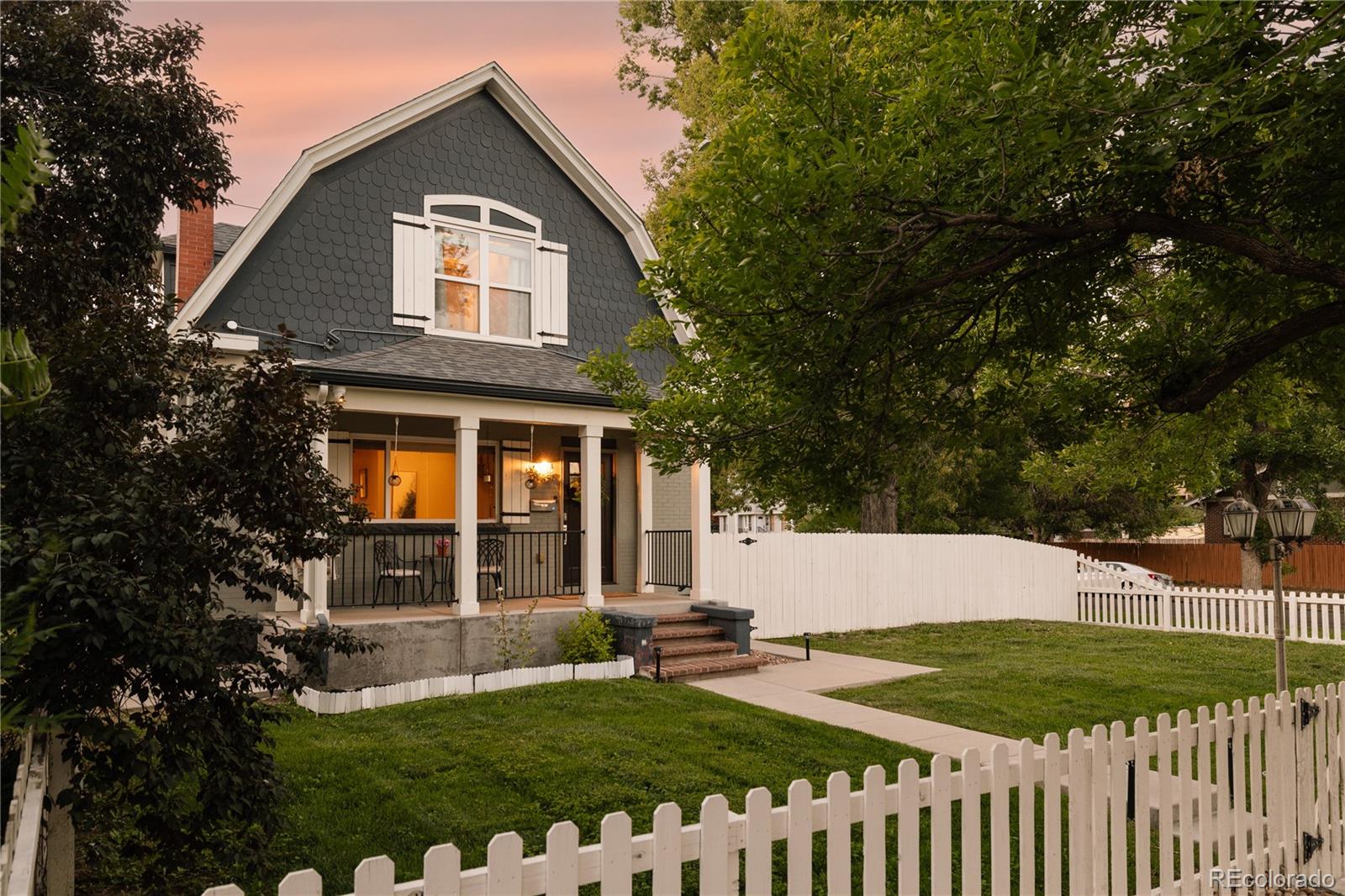 Charm meets modern livability in this spacious 3-bedroom, 5-bathroom Dutch Colonial home set on a generous corner lot in the heart of Denver. Original hardwood floors flow throughout the main level and up the stairs, preserving character that's increasingly rare to find. The updated kitchen brings sleek appliances into a home full of vintage warmth — the best of both worlds. At 3,143 square feet with three bedrooms and four full baths, there's room to spread out. The finished basement with its own entrance offers a versatile canvas — ready to use as-is, or reimagined as a home theater, gym, or additional living suite to suit your needs. Recent upgrades include a new furnace, a tankless water heater, and a whole-home water filtration system — the big-ticket items are already taken care of.The standout feature is the expansive lot, anchored by a separate flex space in the backyard with a 1/2 bathroom— perfect as a home office, studio, gym, or guest retreat, with endless possibilities beyond the main house. Zoned for an ADU, this lot has incredible potential. Location adds to this home’s appeal: a quick, convenient exit off I-25 at 23rd Avenue puts downtown Denver, the airport, and the greater metro area within easy reach — all while tucked into an established, historic neighborhood.A rare combination of vintage character, updated finishes, and outdoor flexibility.