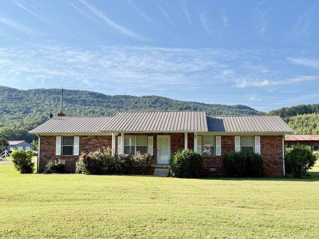 Take a look at this 3-bedroom, 1-bath retreat nestled on 1.6 beautiful acres with gorgeous mountain views as your backdrop! Enjoy peaceful country setting with plenty of room to relax, garden, entertain, or simply take in the scenery.  Conveniently located just a short drive from The Caverns, this house would make a great Airbnb. Offering the perfect blend of quiet country living and easy access to one of the most unique attractions. Whether you're searching for a full-time home, weekend getaway, or investment opportunity, this little slice of Tennessee is full of possibilities.