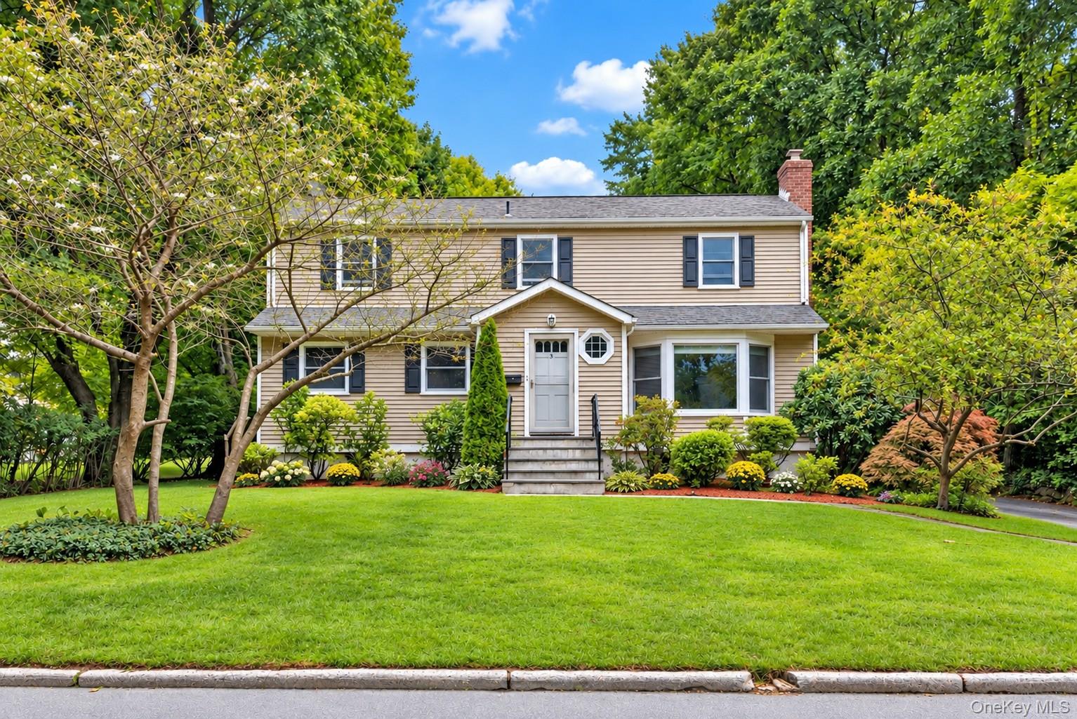 A Fresh New Look at 9 Verne Place! Freshly painted throughout with thoughtful cosmetic updates and refreshed landscaping, this well-maintained4-bedroom, 2-bath split-level home has a clean, inviting feel and is ready for its next owner. Set on a quiet street in sought-after Poets' Corner,one of Hartsdale's most desirable neighborhoods, the home offers a flexible layout with a comfortable living room featuring a wood pellet stovefor added warmth and efficiency, a dining area, and a kitchen with breakfast nook. The upper levels include four bedrooms and two full baths. The finished lower level adds valuable living space with walkout access to the backyard, making it ideal for a media room, home office, orwhatever best suits your lifestyle. A standout feature is the expansive, level backyard, offering plenty of usable outdoor space and endlesspotential for entertaining, gardening, or future improvements. Additional features include an attached one-car garage, generous storage, andclose proximity to shopping, dining, parks, and transportation. Conveniently located just minutes from the Hartsdale Metro-North station withexpress trains to Grand Central in approximately 35 minutes. A wonderful opportunity to move right in, personalize over time, and make thishome your own.