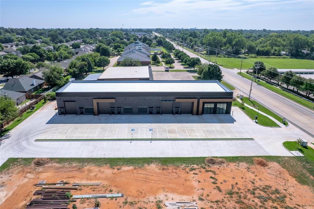 FOR LEASE! Studio Row is now complete and actively leasing! This newly constructed two-story brick office/warehouse development offers modern, fully climate-controlled spaces with ample parking and prime signage opportunities along Main Street. Zoned C-2, the property supports a wide range of uses and is ideal for professional offices with integrated warehouse space, retail storefronts, or other commercial operations. Three suites have already been leased, with limited availability remaining. Each unit features a black brick exterior, white oak-inspired finishes, oversized windows, and layouts that can be built to suit tenant needs. Conveniently located less than two miles from I-35 and three miles from Highway 9. Available suites: Suite 101-2,300-3,300 SF (MLS# 1154385), Suite 105-1,260-1,750 SF (MLS# 1190711), Suite 117-1,260-1,750 SF (MLS# 1190718), Suite 121/125-2,260 SF (MLS# 1190723). Suites 101 and 105 can be combined for 5,050 SF at $20/SF, while Suites 117 and 121/125 can be combined for 4,010 SF at $16.50/SF.