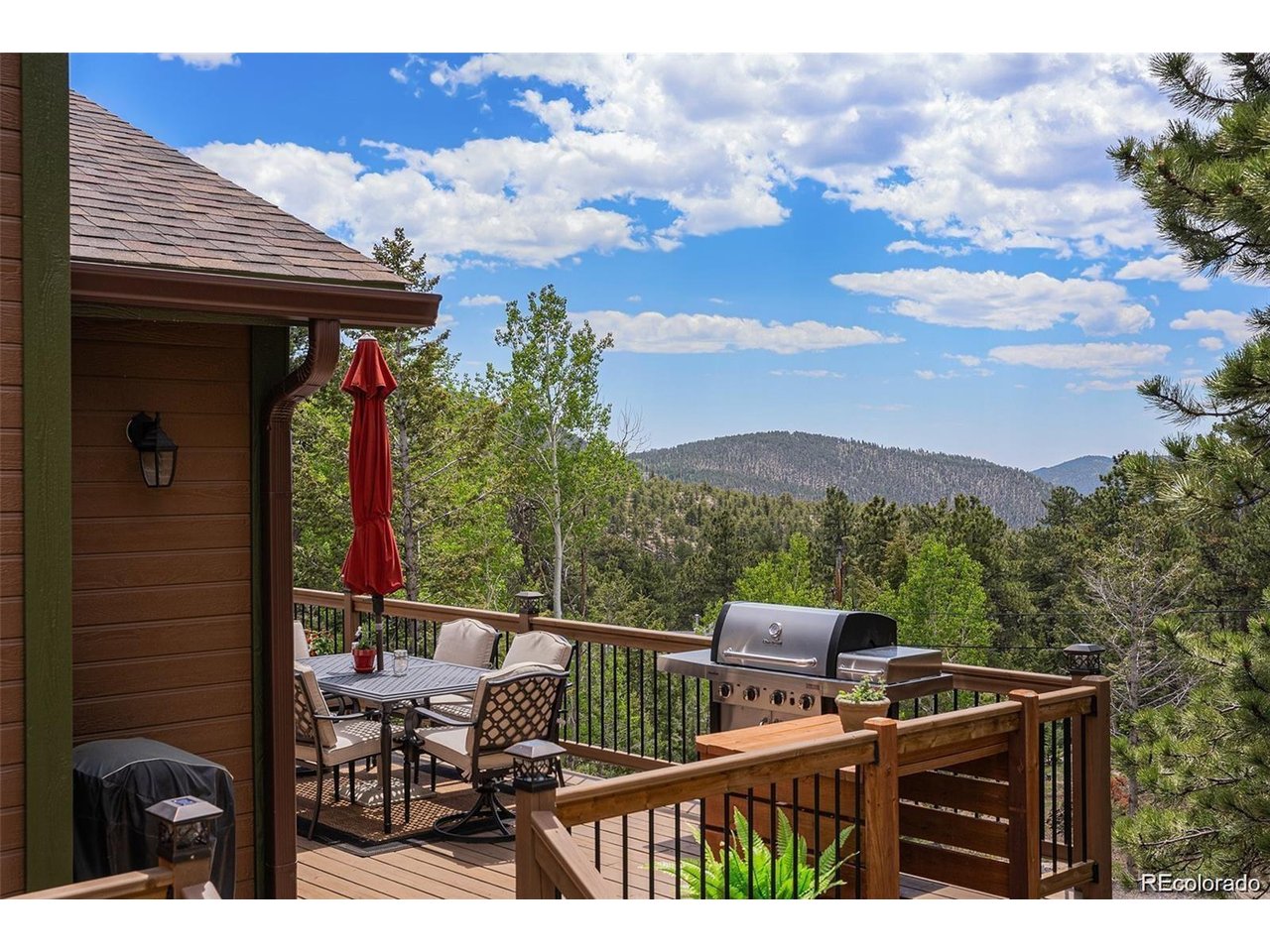 This isn't just a home-it's a lifestyle. A rare opportunity to own a stunning, nearly new mountain retreat that offers everything you've been searching for: privacy, beauty, quality, and unbeatable access to the great outdoors. Expertly built just two years ago by one of Estes Park's most respected and experienced builders, this home was designed with intention and crafted with care. Set on 1.2 acres and backing directly onto protected National Forest, your backyard becomes a gateway to adventure. Step out of your door and onto endless hiking trails. Watch elk graze, wild turkeys wander, and eagles soar-all from the comfort of your own private haven. Inside, every detail has been carefully curated for comfort and efficiency. High-efficiency Andersen heat-lock windows flood the home with natural light while keeping energy bills low. Enjoy the ease of soft-close kitchen cabinets, the beauty of an oak staircase, and the peace of mind that comes with a hybrid electric water heater and a high-efficiency furnace. Stay cozy year-round with a wood-burning fireplace that brings warmth and charm to chilly mountain evenings. Fiberglass exterior doors add both durability and energy efficiency. Just minutes from downtown Estes Park, you'll enjoy the best of both worlds-secluded mountain living with convenient access to shops, dining, and community amenities. Don't miss this rare opportunity to own a piece of Rocky Mountain paradise. Schedule your private tour today!