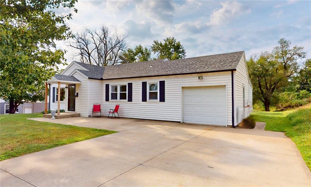 This 1955 home has been thoughtfully maintained, featuring three comfortable bedrooms and a full bathroom. You'll love the warm feel of the mixed flooring, with both cozy carpet and classic wood. For added convenience, the home also includes a main-level laundry room and a one-car attached garage, with an additional detached garage at the rear of the property. Enjoy outdoor living on the charming deck, perfect for entertaining or relaxing. Stay comfortable year-round with electric cooling and forced-air heating.