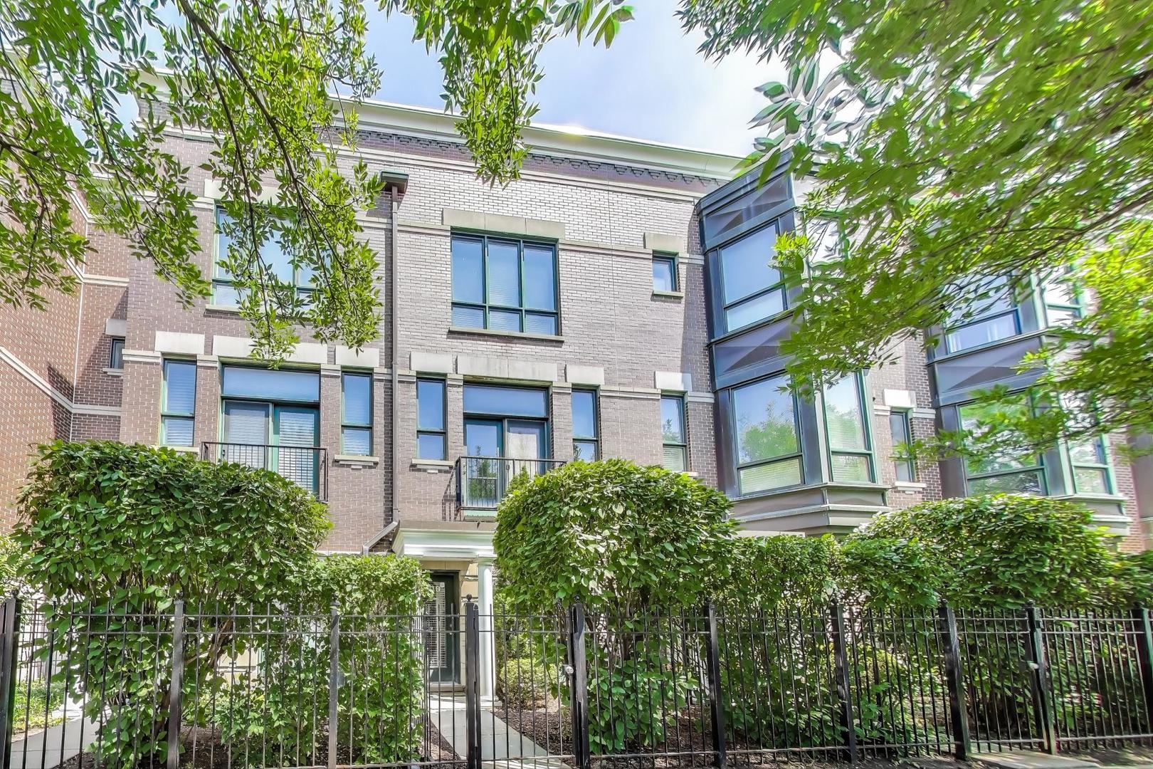 This is the home you have been waiting for! A move-in ready, brick townhome just steps from the shops and restaurants in Old Town. Functional floor plan with east & west exposures, 4 levels of living space above ground with incredible natural light. Entry level welcomes you to an inviting foyer, with an office/den, and attached 1 1/2 car heated garage. The 2nd floor is the heart of the home with open concept kitchen/living/dining rooms featuring 10' ceilings, hardwood floors, a gas fireplace, powder room, and an 8 x 7 balcony for grilling or enjoying your morning coffee. The functional kitchen includes an island, 42" cabinets, black granite countertops, and stainless-steel appliances. 3rd floor features primary suite and second bedroom with ensuite bath. The spacious primary bedroom ensuite bath with a black granite vanity and oversized shower with double shower heads and beautiful stone flooring. The 4th floor is a bright, open space that could be used as a 3rd bedroom, family/game room, home office, playroom or gym with access to the east-facing 12x7 roof-top deck overlooking the courtyard. Fee simple homeowner's association means a low monthly HOA fee of $246 with professional management. Immaculately maintained home with important improvements: GE Slide-In Gas range (2024), 1st floor furnace (2022), 4th floor furnace (2021), one AC (2021), complete replacement of roof, rooftop deck , scuppers (2021), water heater (2020), washer/dryer (2018), and more! Parking available in development for guests and ample street parking on Sedgwick.. Enjoy the neighborhood feel of tree-lined Sedgwick Street, while living near everything Old Town offers. The location achieves nearly perfect scores for walkers and bikers with countless nearby restaurants, shops, and other attractions.