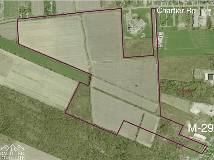 Approximately 144-acre property with plethora of potential uses.  Frontage on both Chartier Rd and M-29 (S Parker St) which is a class-A road with Average Annual Daily Traffic over 6,000.  City Water & Sewer available from both M-29 & Chartier Rd.  Frontage on S Parker zoned Industrial, frontage on Chartier zoned Residential.