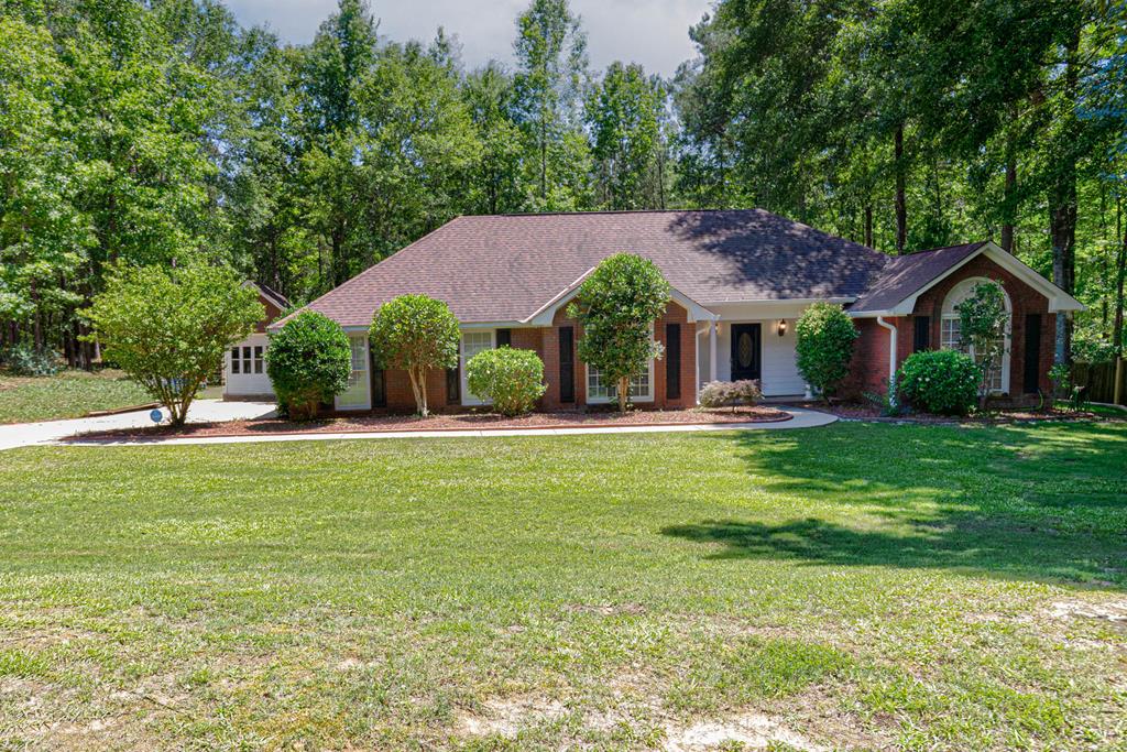 Well-maintained, one owner and move-in ready in a quiet South Harris County neighborhood with no HOA! All Brick. Three bedrooms, Two updated baths! No carpet; LVP and Ceramic floors for ease of care. Roof is 7 years old, HVAC 7, Water heater 6, pool liner one year old! Sunroom has been enclosed with sliding, screened windows and is conditioned with a spit system and has a bubbling hot tub that passes with sale. Owners are also leaving the stainless fridge and new stackable W/D! Outside find a detached garage/workshop with upper floor bonus area with pull-down stairs, potting shed, fenced yard and pool with new liner. Property backs up to a large landowner's acreage for a nice woodland feel.