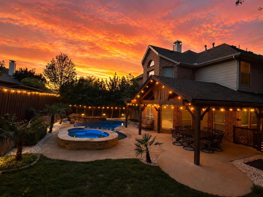 Tucked away on a quiet cul-de-sac in the highly sought-after Stonebridge Ranch, this McKinney residence offers the lifestyle buyers are looking for with privacy, outdoor living, and access to top-rated McKinney schools. Designed for everyday comfort and entertaining, the home stands out for its backyard experience and layout. The private backyard is a highlight, featuring an extended covered patio, a sparkling pool and spa with a waterfall feature, and an additional covered area for grilling, all surrounded by lush landscaping creating a peaceful, retreat-like setting.  Inside, the home offers a balance of open living and defined spaces. The living room is filled with natural light, centered around a fireplace with built-ins, with bay windows framing views of the pool. The kitchen has been refreshed with painted cabinetry, granite countertops, a Frigidaire commercial-grade 5-burner gas cooktop, and a KitchenAid matte stainless convection oven, flowing into the breakfast nook. A dedicated study provides an ideal work-from-home space, while the formal dining room, powder bath, and utility room with cabinetry add function. Upstairs, all bedrooms are conveniently located. The primary suite features vaulted ceilings and bay windows, offering a spacious retreat. The ensuite bath includes dual vanities with a sitting area, freshly painted cabinetry, updated lighting and plumbing fixtures, a jetted tub, and separate shower. Three additional bedrooms include walk-in closets, while an oversized game room with a walk-in storage closet provides flexible living space. Recent updates include fresh paint throughout, new carpet, updated lighting, and newly installed window blinds, enhancing the home’s move-in ready appeal. Residents of Stonebridge Ranch enjoy access to exceptional amenities, including an aquatic center, beach club, tennis and pickleball courts, parks, playgrounds, fishing, hike and bike trails, and a full calendar of community events.