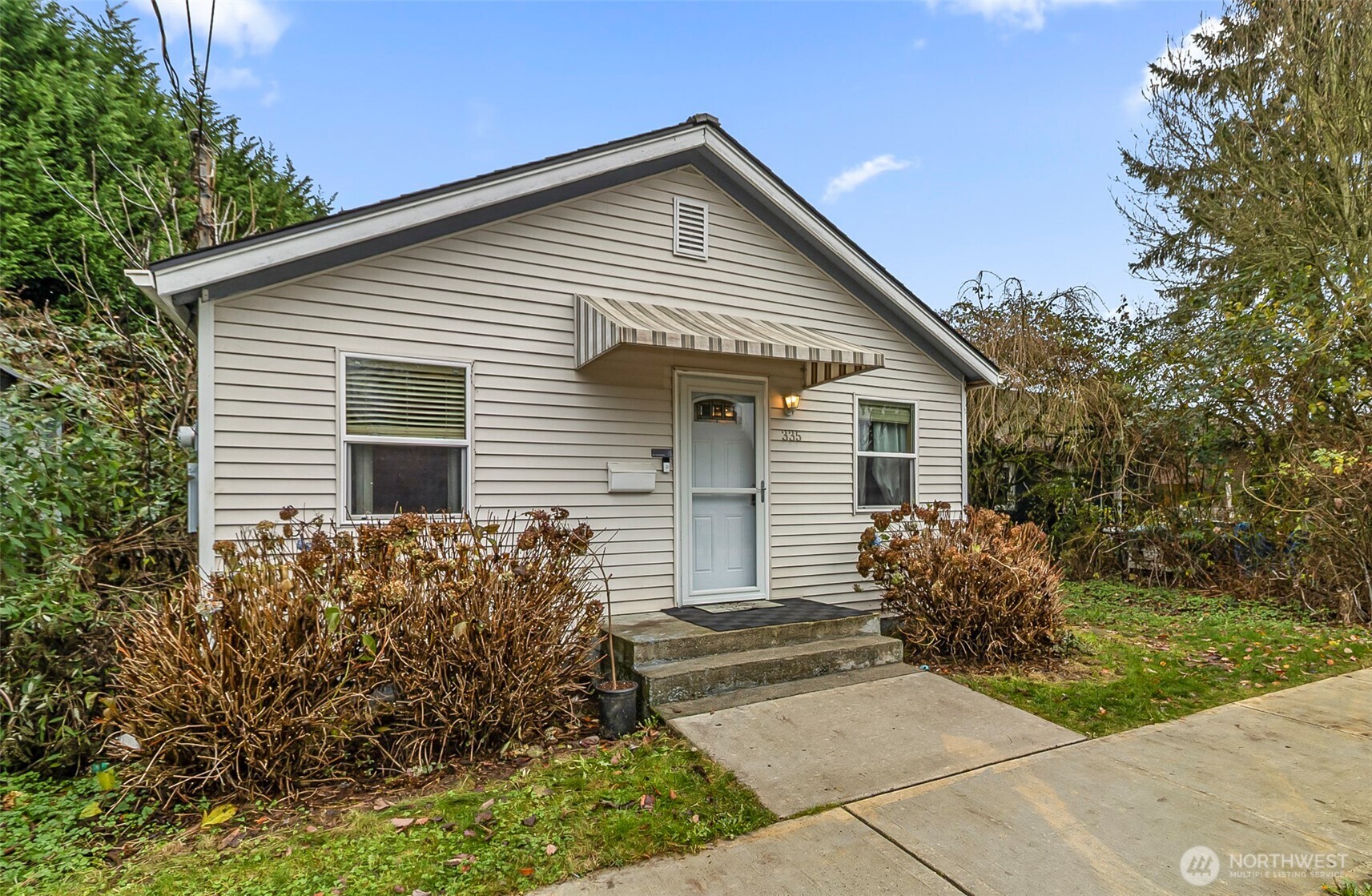 Quaint Cottage Style Home on a Corner Lot is Looking for New Owners...Come in and Take a Peek