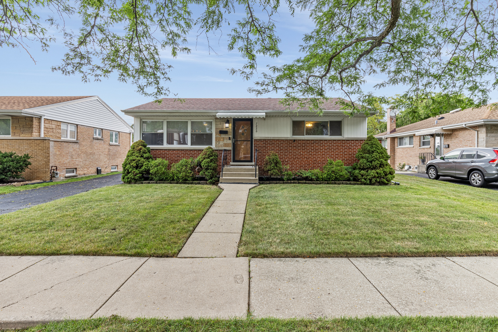 Welcome to this beautifully maintained 3-bedroom, 2-bath brick ranch nestled in a desirable Niles neighborhood! This home offers a perfect blend of classic charm and modern updates. Step inside to find two spacious main-level bedrooms with gleaming hardwood floors and an abundance of natural light. The recently remodeled kitchen features stylish finishes and offers a functional layout, perfect for everyday living and entertaining. Downstairs, you'll discover a large fully finished basement with durable and sleek epoxy flooring-ideal for additional living space. An extra bedroom in the basement offers flexibility as a home office, recreation room, or personal gym. Enjoy summer barbecues or quiet evenings in the expansive backyard, perfect for entertaining guests or simply relaxing outdoors. Don't miss this move-in ready gem in a wonderful location-close to parks, schools, shopping, public transportation, and more. HURRY!