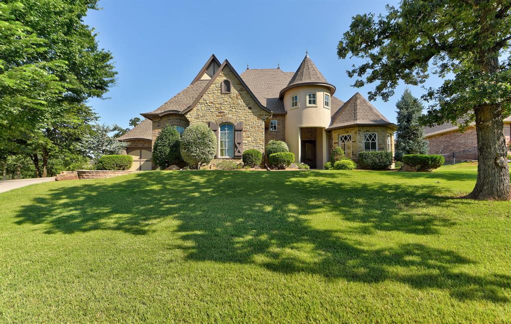 Welcome to your dream home in one of East Edmond’s most sought-after neighborhoods, Bella Terra! This beautifully updated 4-bedroom, 4-bathroom home offers over half an acre of space and luxury, perfect for both everyday living and entertaining. Step inside to discover a thoughtfully designed two-story floor plan that provides ample room for everyone. The main level features three spacious bedrooms, 3 bathrooms, a dedicated study, and a private workout/flex room, ideal for a home gym, playroom, or extra office. The upstairs level adds even more versatility with an entertainer’s dream bonus room, complete with an entertainment bar area with extensive custom cabinetry and custom stone-faced wraparound island, plus a fourth bedroom and a beautifully remodeled bathroom with a new custom shower. Enjoy recent updates including fresh interior paint, newer carpet, and a durable impact-resistant roof, all of which offer peace of mind and a move-in-ready experience. Outdoor living shines with an oversized covered back patio, built-in grill, and beverage refrigerator, all situated beneath a spacious open-air deck, perfect for entertaining guests or relaxing in your private backyard retreat. Everything about this home screams SPACIOUS, from the oversized laundry room,  generously sized bedrooms and expansive back yard, you wont be short of room anywhere you look!  Don’t miss your chance to own this incredible home in Bella Terra! Homes like this don’t stay on the market for long. Schedule your private showing today!