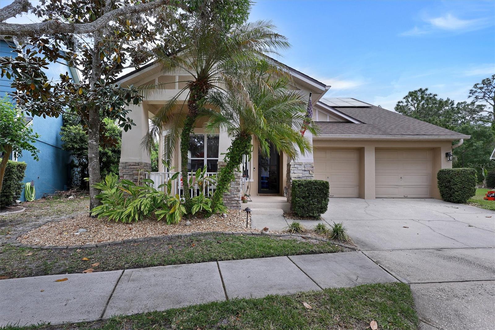 Move-in ready waterfront living in Avalon Park with major 2022 upgrades that add real long-term value. This beautifully maintained 3-bedroom, 2-bath home offers 1,908 sqft. of peaceful Florida living. Major upgrades include a new roof, solar system, A/C, and water heater all completed in 2022, giving buyers confidence, energy efficiency, and years of major improvements already done.This is a hidden paradise with one of the most scenic views in the area, overlooking a tranquil pond and lush conservation with no rear neighbors. Enjoy daily views of nature, birds, deer, and wild turkey from your screened lanai, semi-covered back porch, or large covered deck with grill space and convenient propane plumbing.The backyard is designed for true relaxation and entertaining, featuring a lagoon-style saltwater pool with tanning ledge and hot tub, all smart-controlled and designed for low-maintenance enjoyment. Inside, the home offers an inviting open floor plan with beautiful water views, tray ceilings, ceiling fans, and a spacious primary suite with private bath, large walk-in closet, deep garden tub, dual vanity, and private water closet.Additional features include a finished deep garage with utility sink, welcoming front porch, included appliances; range, refrigerator, washer, and dryer, plus a home warranty paid through April 2028.Located in one of Orlando’s most desirable communities, Avalon Park offers A-rated schools, STEM school options, and the lifestyle residents love: live, learn, work, and play just minutes from Downtown Avalon with Publix, CVS, restaurants, bakery, bars, shopping, and more.This is more than a home with a view — it is a move-in ready waterfront retreat with the expensive upgrades already completed.