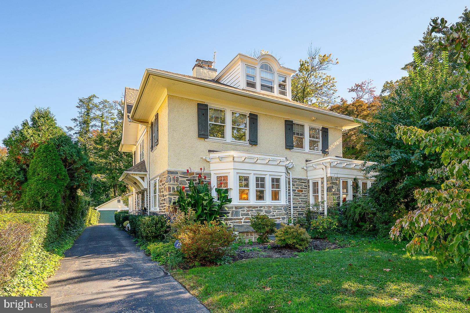 Built in 1900, this classic Bala Cynwyd Colonial blends timeless charm with thoughtful modern updates, creating a home that feels both welcoming and comfortable. From the moment you enter the foyer, you'll notice a natural flow that’s just right. The expansive living room serves as the heart of the main level, anchored by a gas fireplace and a large bow window that floods the space with light. Through a set of French doors, you’ll find a sun-drenched den wrapped in windows that fill the space with natural light and is the perfect spot to unwind, watch TV, or enjoy a quiet evening at home. Across the hall, the formal dining room is ready for holiday gatherings, complete with elegant crown molding and another beautiful bow window.  The kitchen is a clever blend of old and new, featuring granite countertops and modern appliances alongside a charming butler’s style pantry section that pays homage to the home’s history. Just a step down, the breakfast room offers built-in window seating and views of the backyard. If you love the outdoors, you’ll gravitate toward the screened-in porch with its skylights, or step outside to the stone patio for summer grilling. Upstairs, the primary suite features a walk-in closet and an updated bathroom with a frameless shower and rain shower head. Two additional spacious bedrooms with hardwood floors share a well-appointed hall bath that conveniently houses a stackable laundry setup. The third floor offers a private fourth bedroom and plenty of accessible attic storage, while the unfinished basement provides even more space for gear and hobbies. Outside, the property includes a long private driveway leading to a two-car detached garage. With a generator hook-up already in place and nearly 3,000 square feet of living space, this home is as practical as it is beautiful.  Ideally located, walk to Cynwyd Elementary,  Bala Cynwyd Middle School, easy access to Cynwyd Heritage Trail, center city, dining, shopping, public transportation