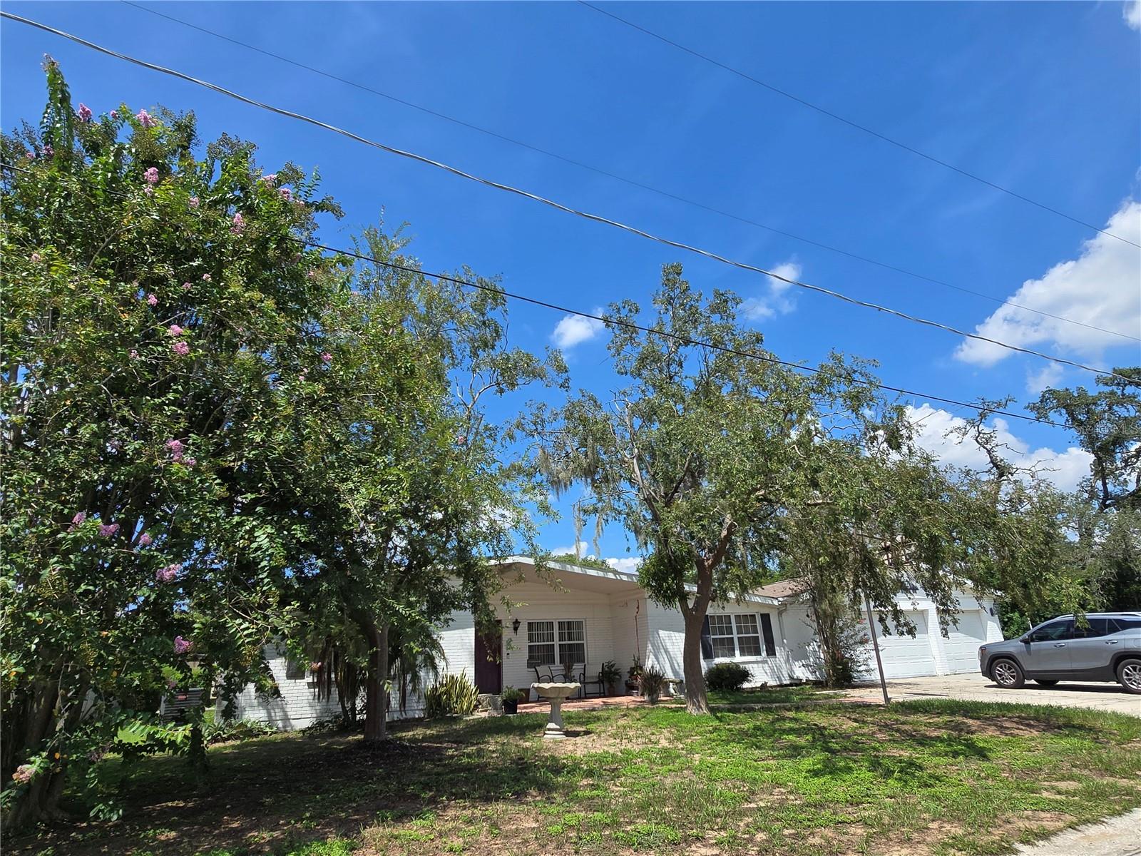 Under contract-accepting backup offers. Bring ALL Offers! Property is in need of repairs and tlc but has strong bones, sits on an over-sized lot and has an attached over-sized garage that can fit 9 cars, an exterior storage she back and front patios and space to run!  Make this home your today!
