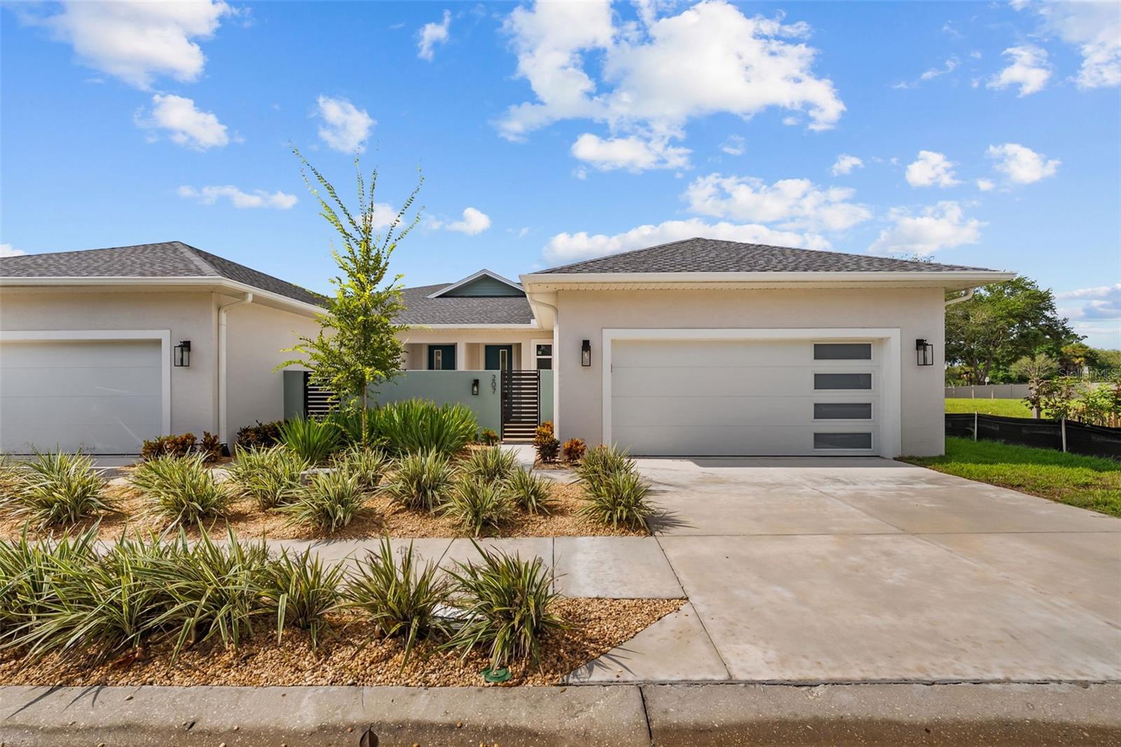 Welcome to effortless coastal living in Anclote Crossing, a boutique, golf-cart-friendly community ideally positioned in Tarpon Springs. This beautifully UPGRADED 3-bedroom, 2-bath villa offers the rare combination of block construction, high-impact windows and doors, a large private yard, and an unbeatable location just minutes from the water, beaches, dining, and the charm of downtown Tarpon Springs.From the moment you enter, the home feels bright, polished, and thoughtfully designed. Wood flooring flows throughout the living areas, complemented by crown molding, oversized baseboards, and carefully selected finishes that give the home a refined yet comfortable feel.The kitchen is truly the heart of the home, featuring upgraded cabinetry, premium GE stainless steel appliances, an upgraded air fryer/convection oven, and beautiful pendant lighting. A custom dry bar with additional storage creates the perfect spot for entertaining, serving, or displaying your favorite pieces. The attention to detail continues into the walk-in closets, where finished cabinetry and built-in storage provide a level of organization rarely found in a villa.Beyond the interiors, the outdoor space is a standout. Enjoy your morning coffee or evening cocktails from the covered lanai overlooking an expansive yard, offering room to create your own private retreat, garden, play space, or entertaining area. The 2-car garage provides plenty of room for vehicles, bikes, beach equipment, and your golf cart.Peace of mind comes standard with concrete block construction and high-impact windows and doors, offering added protection and durability while allowing you to enjoy the Florida lifestyle with confidence. The home also includes a 2/10 builder warranty and a low HOA fee.LOCATION. LOCATION. LOCATION.This is where the lifestyle truly shines. Anclote Crossing puts you close to everything that makes Tarpon Springs special, with water access, beaches, boating, dining, recreation, and entertainment all within easy reach.For the boating enthusiast, marinas, boat clubs, and boat rentals are nearby, making it easy to get out on the water without owning a boat. Spend the day cruising the Gulf, exploring the coastline, or enjoying the area's beautiful waterways — then come home and take your golf cart to dinner.Fred Howard Beach and Sunset Beach are just a quick ride away, offering some of the area's most spectacular sunsets. Grab coffee, meet friends for dinner, or explore local shops just minutes from home. The Sponge Docks and historic downtown Tarpon Springs are close enough to become part of your everyday routine rather than an occasional outing.With a dog park and splash park nearby, beaches around the corner, boating at your fingertips, and a community designed for easy coastal living, this home delivers the lifestyle so many buyers are searching for.Beautifully upgraded. Built for Florida. Ideally located.Come discover the relaxed, refined coastal lifestyle waiting for you at Anclote Crossing.