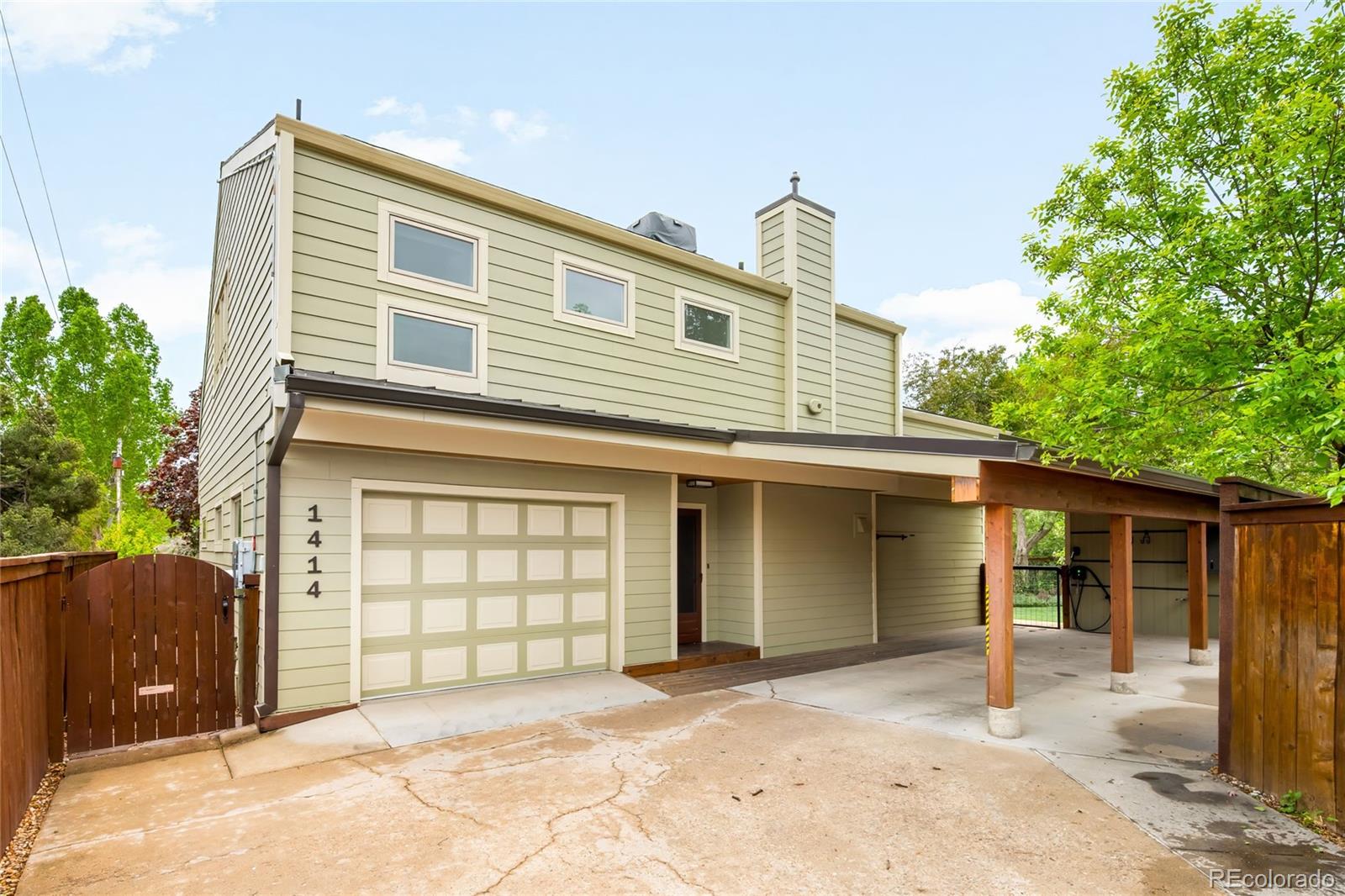 This impeccably maintained Old North Boulder residence offers the perfect balance of location and lifestyle. Tucked away for privacy yet just moments from Downtown Boulder, this home is filled with abundant natural light and showcases stunning views of the Flatirons. An open layout unfolds into an expansive dining area with vaulted tongue-and-groove ceilings and a wall of glass doors that seamlessly connect to a deck with built-in bench seating. The kitchen features stainless steel appliances, a tiled backsplash and a breakfast bar, while the spacious living area is anchored by a fireplace and framed by floor-to-ceiling windows. A dedicated office offers a private home workspace. The primary suite offers vaulted ceilings, a private balcony, a renovated bath and a newly added walk-in closet. Additional highlights include owned solar, newer windows, upgraded baseboard heating and a short-term rental license. A beautifully landscaped backyard enhances the home’s serene, private setting.