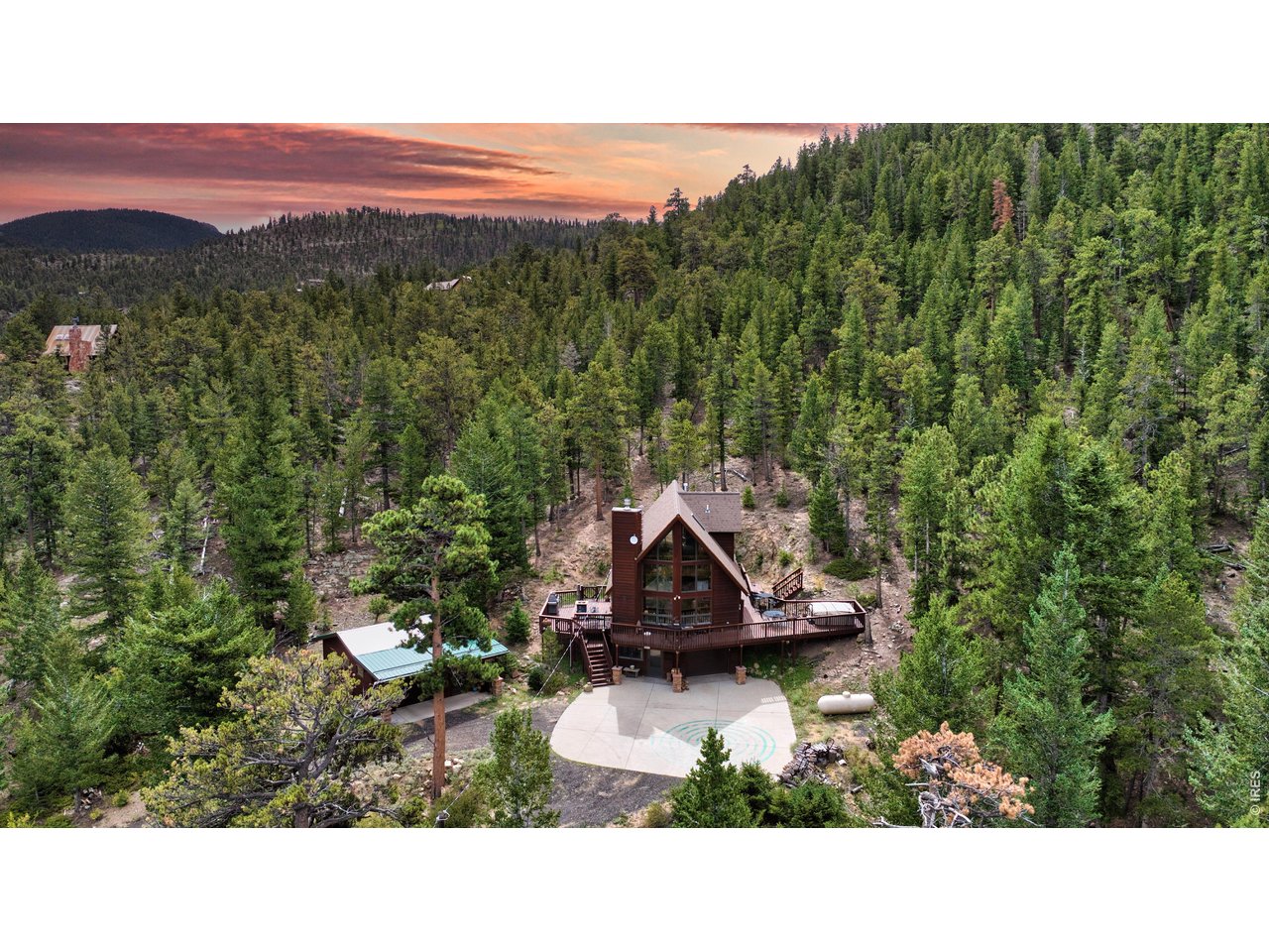 Discover Colorado mountain living at 3804 Dollar Lake Drive, a private Estes Park home for sale on 2.13 scenic acres in the desirable Little Valley neighborhood. Surrounded by mountain beauty and abundant wildlife, this charming 2-bedroom, 2-bath home offers 1,536 square feet of comfortable living space with wonderful views and a peaceful setting.Inside, vaulted ceilings and expansive windows bring in natural light while framing the surrounding mountain scenery. The open-concept floor plan features a cozy fireplace and an easy flow between the kitchen, dining, and living areas-perfect for relaxing after a day in the mountains or gathering with family and friends.Outside, an expansive multi-level deck provides plenty of space to enjoy Colorado's fresh mountain air, beautiful views, and frequent visits from local wildlife. The 2.13-acre lot offers privacy and room to breathe while remaining conveniently located near downtown Estes Park and Rocky Mountain National Park.Whether you're searching for a full-time Estes Park residence, Colorado mountain getaway, or peaceful second home, 3804 Dollar Lake Drive combines acreage, privacy, mountain views, and convenient access to everything that makes the Estes Valley such a special place to call home.