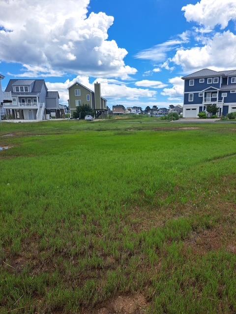 Don't miss out on the opportunity to purchase this canal front lot. Imagine building a beautiful piling home that you and your friends and family can enjoy for many years to come. Whether you are looking to live here year round or have a fabulous vacation home, this is the perfect homesite for you. Start enjoying all that Captain's Cove has to offer. The many amenities include 2 outdoor pools & 1 indoor pool, tennis courts, the community marina & boat ramp, exercise room, the playground and the Marina Club. Just minutes to the beach and a short ride to Ocean City, MD, Chincoteague Island or Assateague Island.