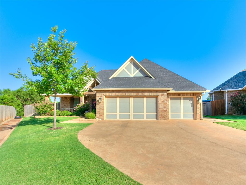 This perfectly maintained and stunning 4-bedroom, 3-bathroom brick home in The Grove offers 2,693 square feet and an oversized 3-car garage. A gabled entry and covered front porch lead inside to an open-concept layout with wood-look tile floors throughout the main living areas.The living room features a stacked-stone gas fireplace with built-in shelving. The kitchen has a high end custom look with quartz counters, a large island with plenty of seating, gas cooktop, and stainless appliances. A dedicated office provides space for remote work or study.The primary suite is spacious with plenty of natural light, with an ensuite bath offering a freestanding soaking tub, dual vanities, separate walk-in shower, and oversized walk-in closet. Three additional bedrooms offer space for family or guests.The backyard has a covered patio with a wood-burning fireplace and backs up to a greenbelt for added privacy and a more quiet feel.Located in The Grove, this beautiful home is located in Deer Creek schools and close to shopping, dining, and parks or wherever you need to be.