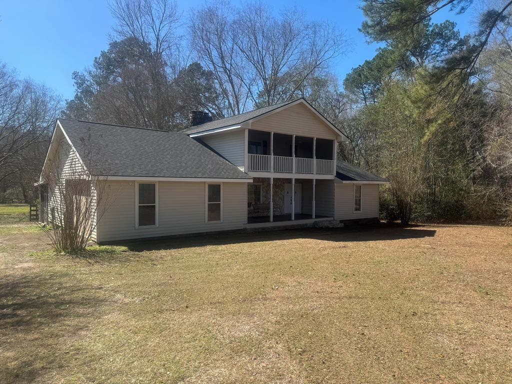 This house has plenty of room for you and the family...2 Bedrooms and a bath are on the main floor with a huge Bedroom/Bath upstairs with an added bonus of a covered porch and fireplace...Dont miss out on this one