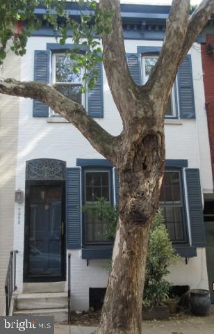 Nestled in the vibrant Art Museum Area, this charming 2-bedroom, 1-bathroom townhouse offers a perfect blend of historic character and modern convenience. Built in 1920, this straight-thru masonry home boasts a full basement, providing ample storage and potential for customization. The inviting layout features cozy living spaces that are perfect for relaxation or entertaining. The neighborhood is a true gem, known for its artistic flair and community spirit. Just a short stroll away, you'll find lush parks and green spaces, ideal for leisurely walks or picnics on sunny days. The Art Museum Area is rich in cultural experiences, with world-class museums, galleries, and local eateries that cater to every palate. The community is well-served by public transportation, making commuting a breeze and connecting you to the heart of the city. On-street parking is available, adding to the convenience of urban living. This home is not just a place to live; it's a gateway to a vibrant lifestyle filled with art, culture, and community engagement. Embrace the opportunity to make this delightful townhouse your own and enjoy all the benefits of living in one of the city's most sought-after neighborhoods. Experience the warmth and charm of the Art Museum Area-your new home awaits!