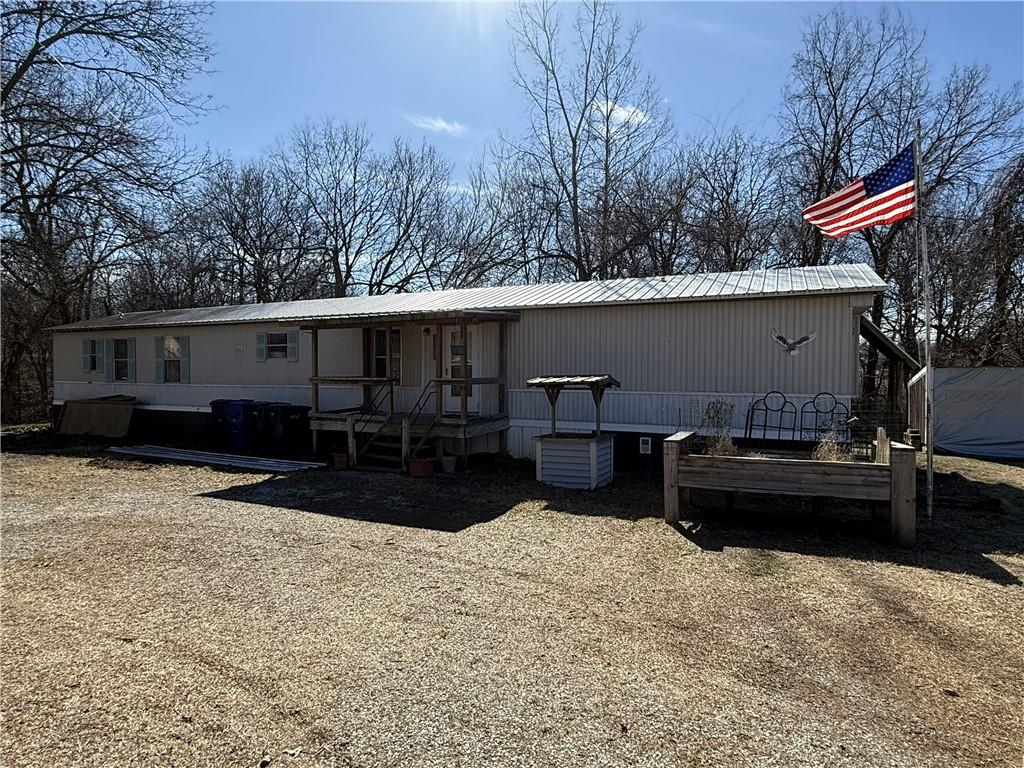 PUBLIC AUCTION: Multi-Unit investment property on 1 Acre Date: March 14th | Time: 12:00 PM (Noon) Secure a high-potential investment or versatile housing at this upcoming public auction! This unique 1-acre property features three distinct dwellings: a cozy, 2-bedroom, 1-bathroom earth contact home known for low utility costs, and two spacious 3-bedroom, 2-bathroom mobile homes. The property includes multiple small sheds for workshops or tenant storage, all while maintaining incredibly low overhead with 2025 taxes of only $748.98. Whether you are looking for a starter rental portfolio or a private investment, this property offers massive income-producing potential on a manageable lot.
