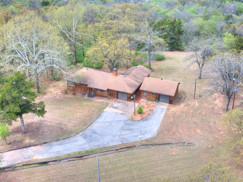 Opportunity awaits on this expansive wooded 4 acre property featuring a 3 bedroom, 2 bathroom home full of original character and endless potential. Being sold as-is, this residence offers the perfect canvas for buyers ready to remodel, restore, or reimagine the space to fit their vision.Whether you’re a homeowner looking for a renovation project or a developer seeking your next investment, this land delivers. The generous acreage provides ample room to build an additional homes, allowing you to keep the existing house as a guest house, rental, or private retreat.Don’t miss this rare chance to capitalize on a property with significant upside whether you choose to renovate, build, or develop, the potential here is undeniable.