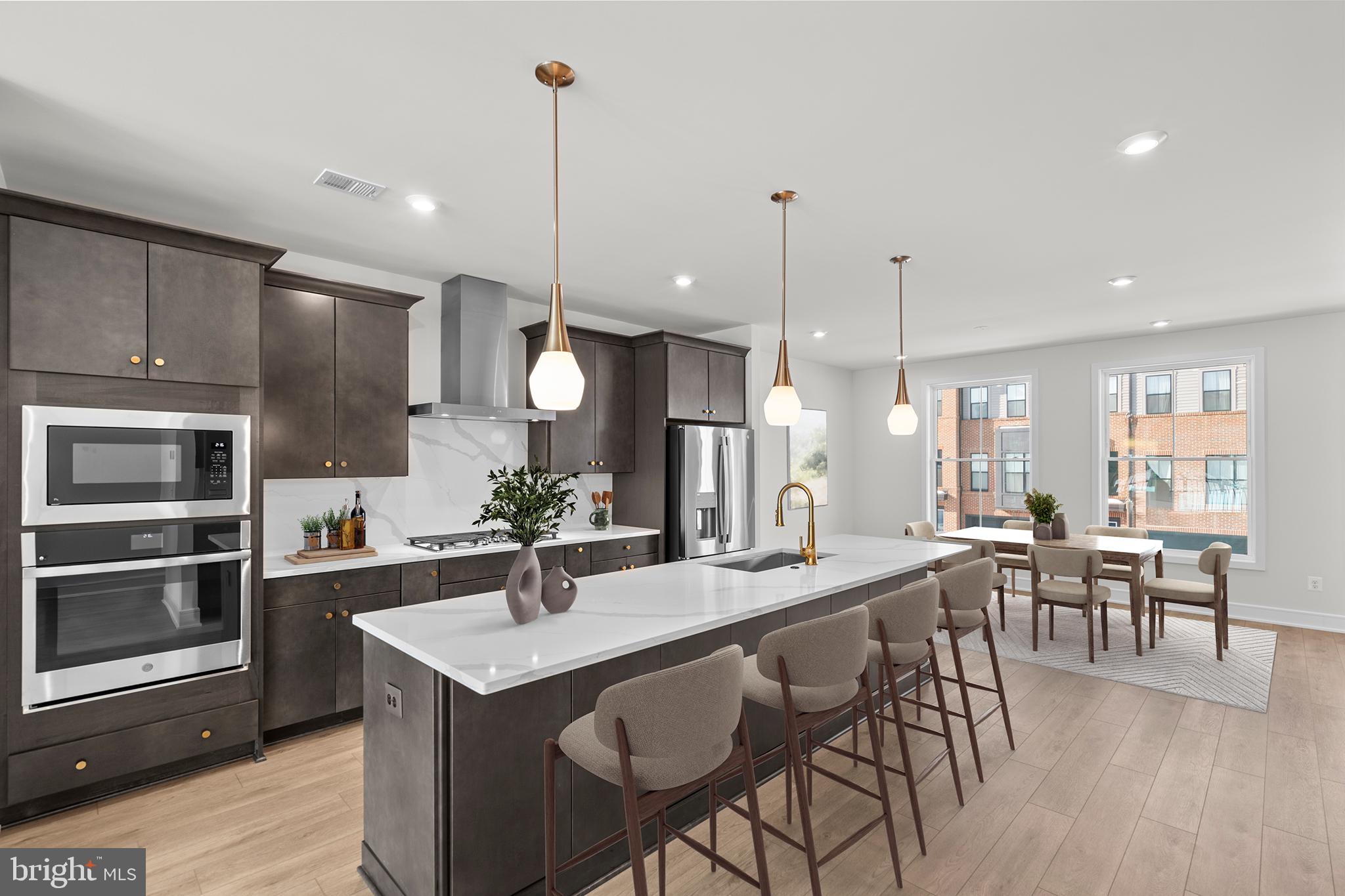 Discover a brand new TOWNHOME by Van Metre Homes at West Park III in Brambleton, VA. Experience the Tyce 24-F2 – Homesite 4362 at West Park III—a two-car, front-load garage townhome with three bedrooms, three full bathrooms, and one half bathroom ready for you to move in IMMEDIATELY. Designed for flexibility and flow, this floorplan features a private backyard and a spacious deck for easy outdoor living. Whether you’re gathering or unwinding, the heart-of-the-home kitchen and great room—with an electric fireplace—create the perfect space for any occasion. A nook off the dining area adds everyday versatility and connection. Being a new build, your home is constructed to the highest energy efficiency standards, comes with a post-settlement warranty, and has never been lived in before! Take advantage of closing cost assistance by choosing Intercoastal Mortgage and Walker Title. This residence is not just a house; it's an experience, a harmonious blend of thoughtful design and contemporary luxury. Make your move now. Schedule an appointment today! ----- Welcome to West Park III, a vibrant neighborhood of dreamy townhomes with rooftop terrace options in the award-winning community of Brambleton, VA. Experience an exceptional living experience in Brambleton, a flourishing community where modern living meets suburban charm. This family-friendly community offers miles of trails, tot lots, parks, pools, highly sought-after schools within walking distance, and so much more at your fingertips. With the bustling Brambleton Town Center just down the street, you can enjoy endless shopping, dining, and entertainment options. Rise to new heights at West Park III and experience the perfect blend of comfort, convenience, and connectivity—a place where cloud nine is just the beginning. -----*Other homes sites and delivery dates may be available. Pricing, offers, and availability are subject to change without notice. Images, renderings, and site plans are for illustrative purposes only and may not reflect actual homes or features. Some images may depict interior designs created in collaboration with AI. West Park III lies within the Airport Impact Overlay District (entirely within 1 Mile Buffer). Due to its proximity to Dulles International Airport, this site is subject to aircraft overflights and aircraft noise. Additional Terms and Conditions may apply. Please see a Van Metre Sales Advisor for details.