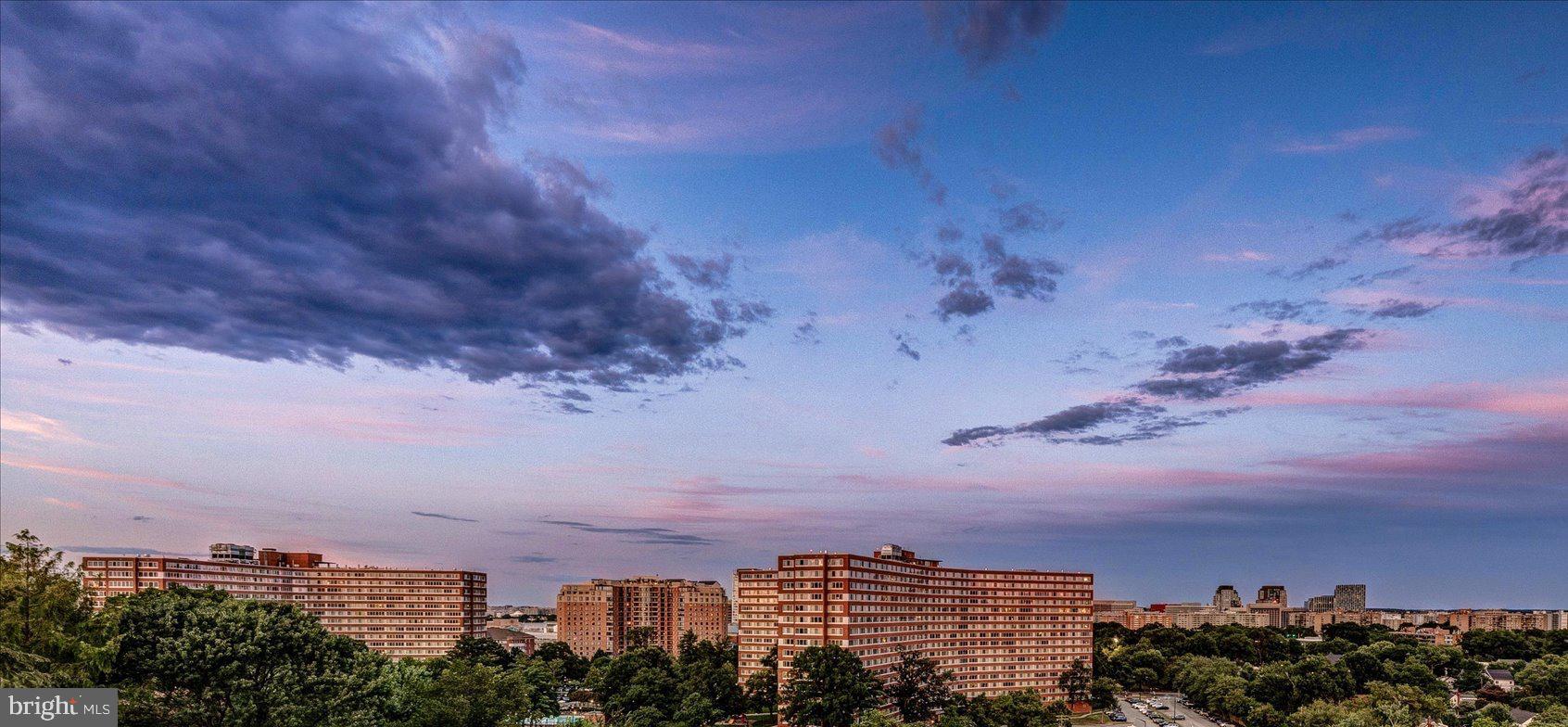 One-of-a-kind city and monument views from this custom-built home in the coveted Arlington Ridge neighborhood.  Offering over 13,000 square feet and featuring 7 bedrooms, 8 full bathrooms, 3 half baths, numerous decks off each level and a spacious terrace with pool.  An entertainer’s dream, the main level boasts an open, flowing floor plan and offers a wall of windows overlooking the expansive deck with dramatic city views. The kitchen boasts commercial-grade appliances (perfect for hosting large parties) dual islands, extensive storage and a walk-in pantry.  The sun-filled family room has a two-story stone wood-burning fireplace.  Just off the kitchen is a comfortable office featuring a two-sided gas fireplace shared with the wood paneled library.Tucked away behind the garage is a separate area with its own entrance, perfect for a home office, in-law or nanny suite and is complete with two living spaces, bedroom with full bath and powder room.  Upstairs you’ll find the spacious primary suite with dramatic vaulted ceiling, wall of windows, gas fireplace, spa-like bath, dressing area, large walk-in closet and its own private deck. Four additional bedrooms (all ensuite), teen space, music room with second deck and laundry are also located on this level.  On the top level you’ll find a versatile loft space with full bath, sun-loft with fireplace and city view deck with monument views.The walk-out lower level has a large recreation room, home gym area, theater, hobby room, climate-controlled wine-room and guest suite.  The large terrace and deck offer numerous seating and dining areas and the beautiful heated pool.   Arlington Ridge is ideally located for a quick trip downtown, shopping at Pentagon City/Pentagon Row/National Landing and is close to both Amazon HQ2 and Reagan National Airport.