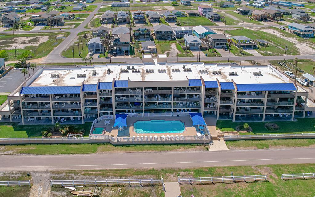 PERFECT RENTAL WITH GREAT AMENITIES! Laguna Reef studio condo. First floor unit with charming coastal dcor. Easy access on the ground level from the parking lot. Equipped with a mini fridge and microwave for your convenience. Laguna Reef offers a beautiful lobby, sparkling pool & hot tub, professional management, and of course, the fantastic approx. 1200' lighted fishing pier!