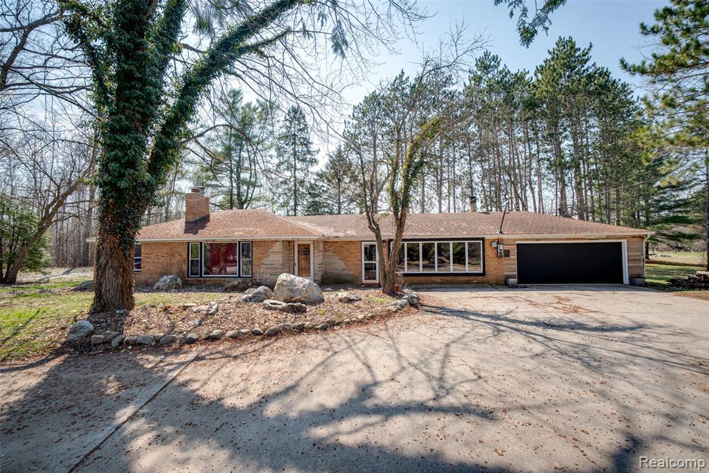 Nestled on over 7 beautiful acres, this charming 3-bedroom home offers the perfect opportunity to enjoy peaceful country living while still providing plenty of space to spread out. With approximately 1,400 square feet, the home is warm and inviting, offering comfortable everyday living surrounded by scenic views. A standout feature of the property is the impressive 40x140 barn, complete with insulation, heat, air conditioning, and a durable 6-inch concrete slab. Whether you need space for hobbies, equipment, storage, a workshop, or your own business venture, this versatile barn offers endless possibilities. This unique property combines the tranquility of rural living with the functionality and flexibility you have been looking for.