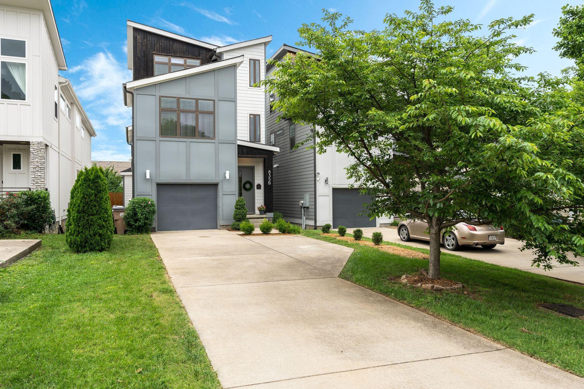 Welcome to this thoughtfully designed 4-bedroom, 3.5-bath home nestled in one of Nashville’s most walkable and vibrant neighborhoods. Take advantage of top-rated restaurants, coffee shops, grocery stores, and fitness studios just steps from your door, or take a short stroll to experience all that 12 South and Sevier Park have to offer.  This Aspen Construction detached home features a functional open layout, ideal for both daily living and entertaining. The kitchen is equipped with a gas cooktop, walk-in pantry, ample countertop space, and a large island. Enjoy conveniences such as a gas fireplace, sand and finish hardwood flooring, smart thermostat and prewired for surround sound.  Upstairs, the primary suite offers vaulted ceilings and a well-appointed bathroom with a freestanding tub and frameless glass shower, built in cabinetry and a water closet. The spacious third-floor includes tons of natural light with a bonus room as well as a full bath and an additional bedroom, offering flexible living space for guests or a home office.  Additional features include a one-car garage and a parking pad, a built in mudroom/drop zone, walk-in laundry room, jack and jill bathroom between guest bedrooms, a fully fenced backyard for privacy, and an oversized deck perfect for outdoor enjoyment.  This move in ready home blends quality finishes, modern functionality, and a prime location.  Buyer/ buyers agent to verify all pertinent info including but not limited to sq. ft. & schools
