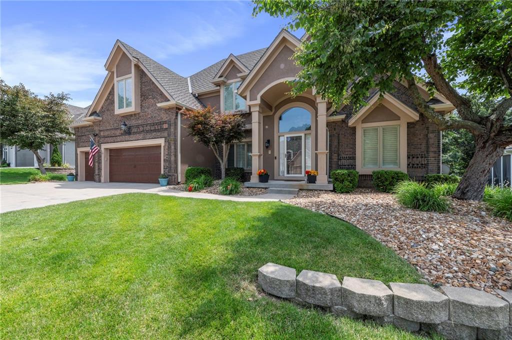 Amazing CUSTOM built 1 1/2 story home w/ perfect private treed backyard in Riss Lake on Clearwater Point! Contemporary style w/ open floor plan and cathedral ceilings in hearth room and 2 story great room!  The cathedral ceiling on the deck helps the great room flow towards the lush backyard and firepit. Kitchen is large w/ 2 islands. Fireplace and soaring floor to ceiling windows in the hearth room. Primary Suite is oversized w/ room for a sitting area or office location. Double vanity, walk in shower and whirlpool tub w/ new carpet. Walk in closet has plenty of space with it's design. Second floor has loft space for office or play room. Configuration of the 3 bedrooms and 2 baths are a dream! Bedroom #1 has its own bath, Bedroom #3 is unbelievable - so much sq footage! WOW ! NEW CARPET on 2nd floor. NEW interior paint on the first 2 levels.  Finished walk out lower level has wet bar, 4th bath, exercise room and potential 5th bedroom / office area. Pool and/ or ping pong table is perfect in the recreational room + media area.  Ample storage with garage door access to the backyard. LL patio is covered and the firepit in the backyard w/ trees is just icing on the cake! NEW Roof, garage doors and exterior paint.