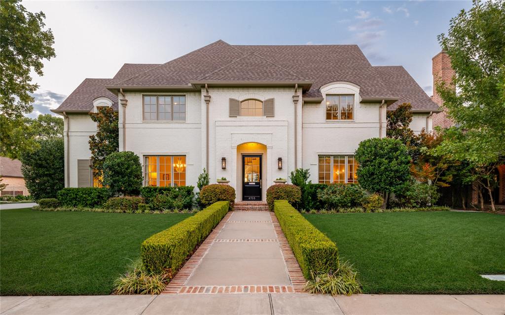 This luxury corner-lot residence at 6705 Aberdeen Avenue is a stunning blend of timeless traditional architecture and California Coastal Cool style in Dallas’ prestigious Preston Hollow neighborhood. Built in 2016 and set on a desirable corner lot with room for a pool, this Meadowbrook Homes build is a 5-bedroom, 5-bathroom residence and offers both sophistication and comfort with thoughtful updates and designer finishes throughout. Inside, large windows flood the home with natural light, highlighting the open-concept design. The elegant floor plan includes formal and casual dining areas, a dedicated office, and a spacious media room. The heart of the home is a show-stopping kitchen, complete with clary sage green cabinetry, a large island, SubZero and Wolf appliances, Carrara marble counters, and designer fixtures—perfect for both entertaining and everyday living. The main house offers five bedrooms and five bathrooms, while a detached guest quarters with a full bath provides privacy and flexibility for visitors or multi-generational living. The guest quarters would make a perfect pool cabana, though it currently serves as a game room or a full living quarters. The covered patio extends the living space outdoors, overlooking a landscaped backyard designed by a landscape architect in 2025. Recent upgrades ensure peace of mind and modern appeal, including a new roof (July 2024) and refinished hardwood floors (Summer 2024). The home also features a two-car garage with gated rear entry for convenience and security. 6705 Aberdeen is a rare offering in one of Dallas’ most sought-after neighborhoods—combining location, luxury, and lifestyle in one exceptional property.