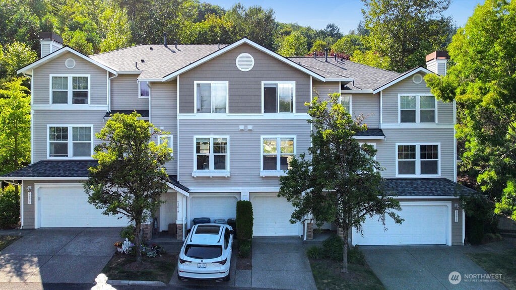 Gorgeous Town home in a quiet & convenient gated community!! You will love the open floor plan w/spacious living areas*backs to a private slightly sloped back yard w/patio, level front yard for easy dog walking*Enjoy cooking in the Open concept Kitchen with updated SS appliances*Spacious Master bedroom w/full bath &double vanity, large soaking tub*secondary bedroom also has its own full bath! This private & pristine neighborhood is so close to I-5 & Sea-tac airport but you would not know it, it is truly tranquil! Walking Trails to The Green River trail, Van Doren's landing park & more!  The community has a convenient car wash station*The location of this unit is perfect with several guest parking spaces across from the entry to this home.