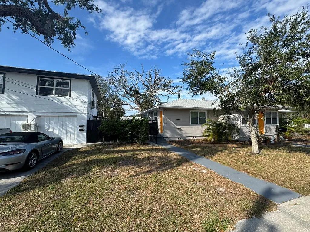 Exceptional income-producing opportunity in Old Southeast! Discover this versatile five-unit multifamily property with projected annual gross rental income of $102,000. Ideally located in one of St. Petersburg's most charming residential neighborhoods, right next to beautiful Lassing Park and the sparkling waters of Tampa Bay! Enjoy the best of both worlds: a quiet, peaceful neighborhood with mature trees and a tranquil atmosphere, yet just a short bike ride from the heart of downtown St. Petersburg. Enjoy convenient access to waterfront parks, award-winning restaurants, museums, shopping, nightlife, and the iconic St. Pete Pier. The property features five rental units across two separate buildings, offering a desirable mix of two 2-bedroom/1-bathroom units, one 1-bedroom/1-bathroom unit, and two studios. A charming garden courtyard separates the buildings, creating an inviting outdoor setting, while select units feature private patios. Shared laundry facilities provide additional convenience. Flexibility is the key! Whether you're looking to expand your investment portfolio, live in one unit while generating rental income from the others, or explore a combination of long-term and short-term rental strategies, this property offers multiple possibilities. Four units are currently operated as traditional rentals, while the fifth has an established Airbnb rental history. With impressive income potential, five income-producing units, and an outstanding location beside Lassing Park and just minutes from vibrant downtown St. Petersburg, this is a compelling opportunity for investors and owner-occupants alike. An exceptional combination of location, income potential, and flexibility!