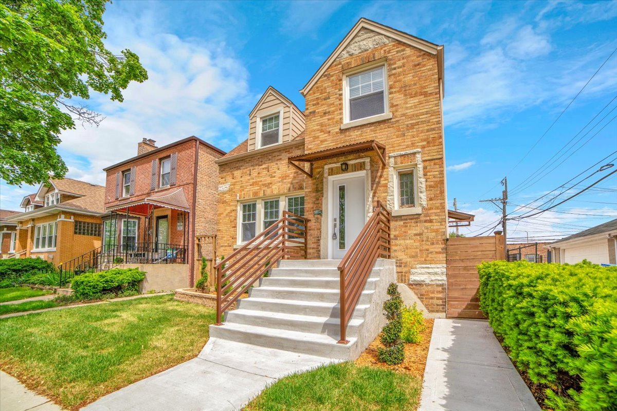 Experience the elegance of new construction quality within this exceptionally renovated 4-bedroom, 3-bathroom single-family home, nestled in the highly sought-after Belmont Cragin neighborhood. Every detail has been carefully curated to exude sophistication and modern comfort. Step inside and be captivated by coffered ceilings, exquisite crown molding, and elegant wainscoting that add depth and character. The luxury kitchen is a true showstopper, featuring a central island, pristine white shaker cabinets, sleek quartz countertops, a full-height backsplash, and premium stainless steel appliances-a perfect fusion of style and functionality. Each bathroom is a masterpiece, showcasing board and batten accents, stunning custom tiling, glass-enclosed showers, and high-end plumbing fixtures, elevating your daily routine into a spa-like experience. A striking side-entrance mudroom, adorned in shiplap paneling and thoughtfully designed with a built-in bench, seamlessly leads you to the main floor or the fully finished lower level. Downstairs, you'll find an inviting family room, an additional bedroom, a full bath, a utility room, and bonus storage spaces for added convenience.  The home is illuminated by LED fixtures and recessed lighting, enhancing its refined ambiance. Hardwood floors grace the main and upper levels, while durable vinyl-engineered flooring adds warmth and resilience to the basement. Outdoor living is equally impressive-enjoy gatherings on your spacious 22x23 deck, or retreat to the private 10x13 upper-level terrace for moments of relaxation. A generous two-car garage completes this impeccable residence, ensuring convenience and security. This home is designed for the discerning buyer seeking unparalleled craftsmanship, luxurious finishes, and modern functionality-a true gem in Belmont Cragin.