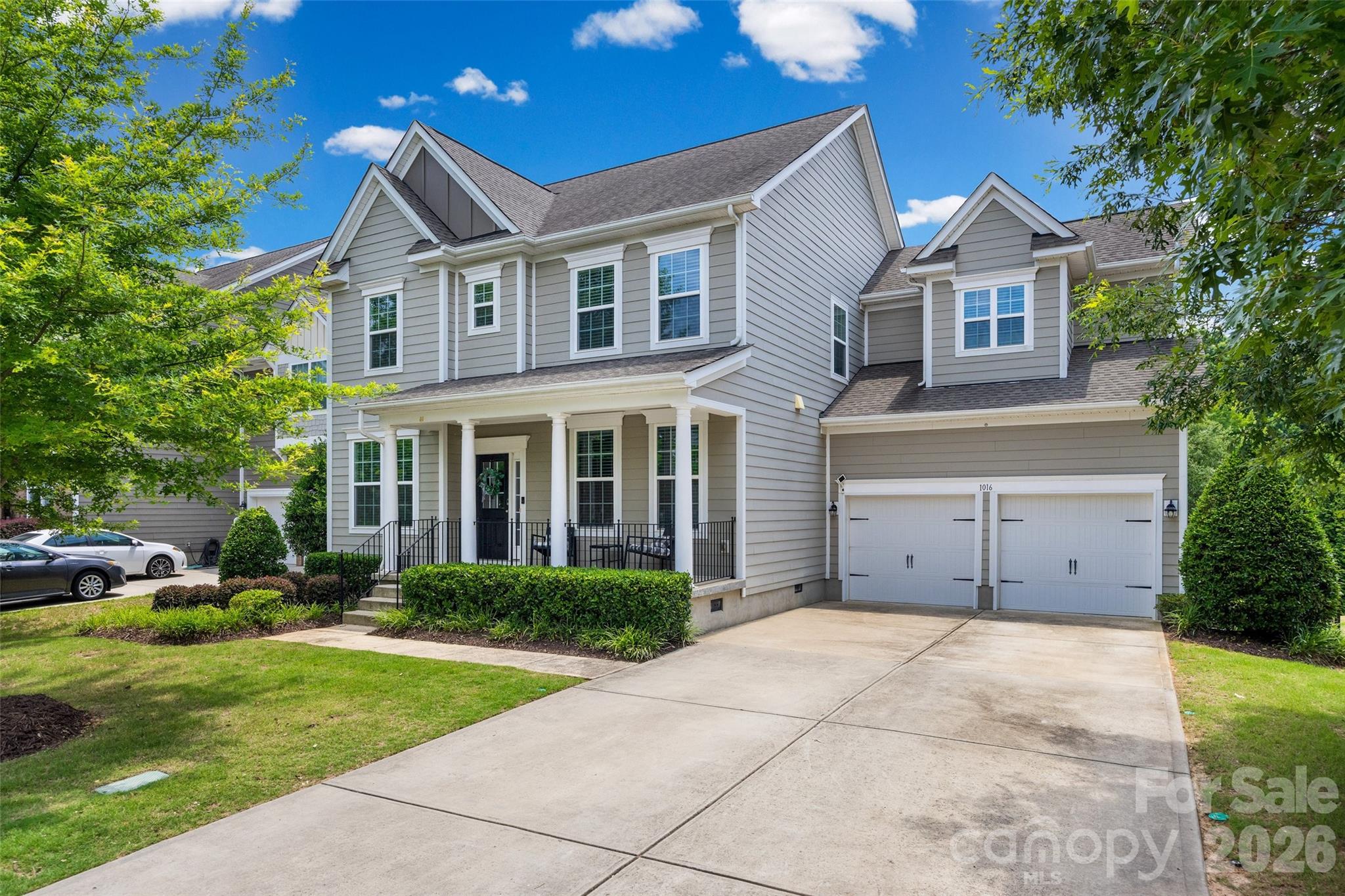 Welcome to luxury living in the highly sought-after Handsmill lakefront community! This beautifully appointed 5-bedroom, 3.5 bath home offers exceptional space, thoughtful design, and outstanding indoor-outdoor living. A charming front porch welcomes you inside, where you'll find a private office with French doors, formal dining room, butler's pantry, and spacious walk-in pantry. The gourmet kitchen is the heart of the home, featuring granite countertops, stainless steel appliances, double ovens, a gas cooktop, and a bright breakfast area surrounded by windows overlooking the backyard. The open-concept living room showcases a cozy fireplace and provides the perfect gathering space. Step outside to enjoy the screened-in deck, expansive paver patio, outdoor fireplace, fenced backyard, and peaceful wooded views backing to HOA-owned green space for added privacy. A standout feature is the private fifth bedroom suite located above the garage with its own staircase, walk-in closet, and full bath—ideal for guests, a home office, media room, or multi-generational living. The spacious primary suite features a tray ceiling, backyard views, garden tub, walk-in tiled shower, and large walk-in closet. Upstairs you'll also find three additional bedrooms, a full guest bath, and a convenient laundry room. Located in the gated Handsmill community, residents enjoy resort-style amenities including a pool, clubhouse, playground, a 24-hour fitness center and community hosted events from block parites to book clubs their is something for everyone. Boating enthusiasts will appreciate the privately owned marina offering wet and dry boat storage through a separate membership. Conveniently located near Lake Wylie shopping, dining, and recreation, this home offers the perfect combination of comfort, flexibility, and lifestyle.https://handsmill.connectresident.com/