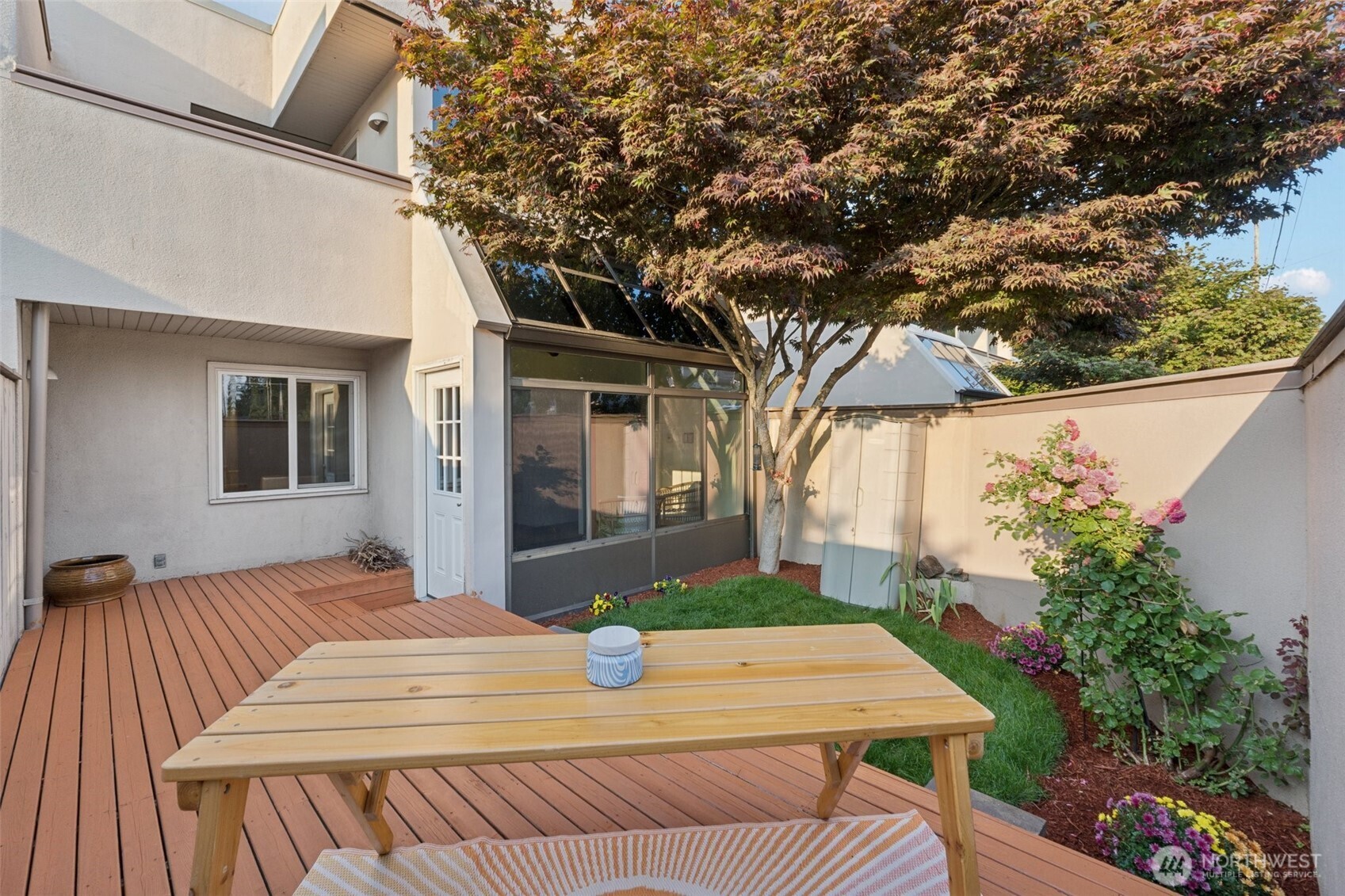 Last week of listing. Spacious 2br, 1.5ba townhouse with generous storage in a prime location just outside Seattle and minutes from beautiful downtown Edmonds. The large primary suite includes a walk-in closet and private balcony, while the luminous solarium fills the home with natural light and opens to a private deck for outdoor enjoyment. Fresh sod, mulch, fresh sealant on the deck. Recently updated with fresh paint, new carpeting, and modern kitchen appliances, home is move-in ready. Features include recessed/track lighting, a convenient nested washer/dryer, and a low-maintenance design. Complete with a private garage and another one for parking, this townhouse blends comfort, style in an unbeatable setting. Pets are allowed.