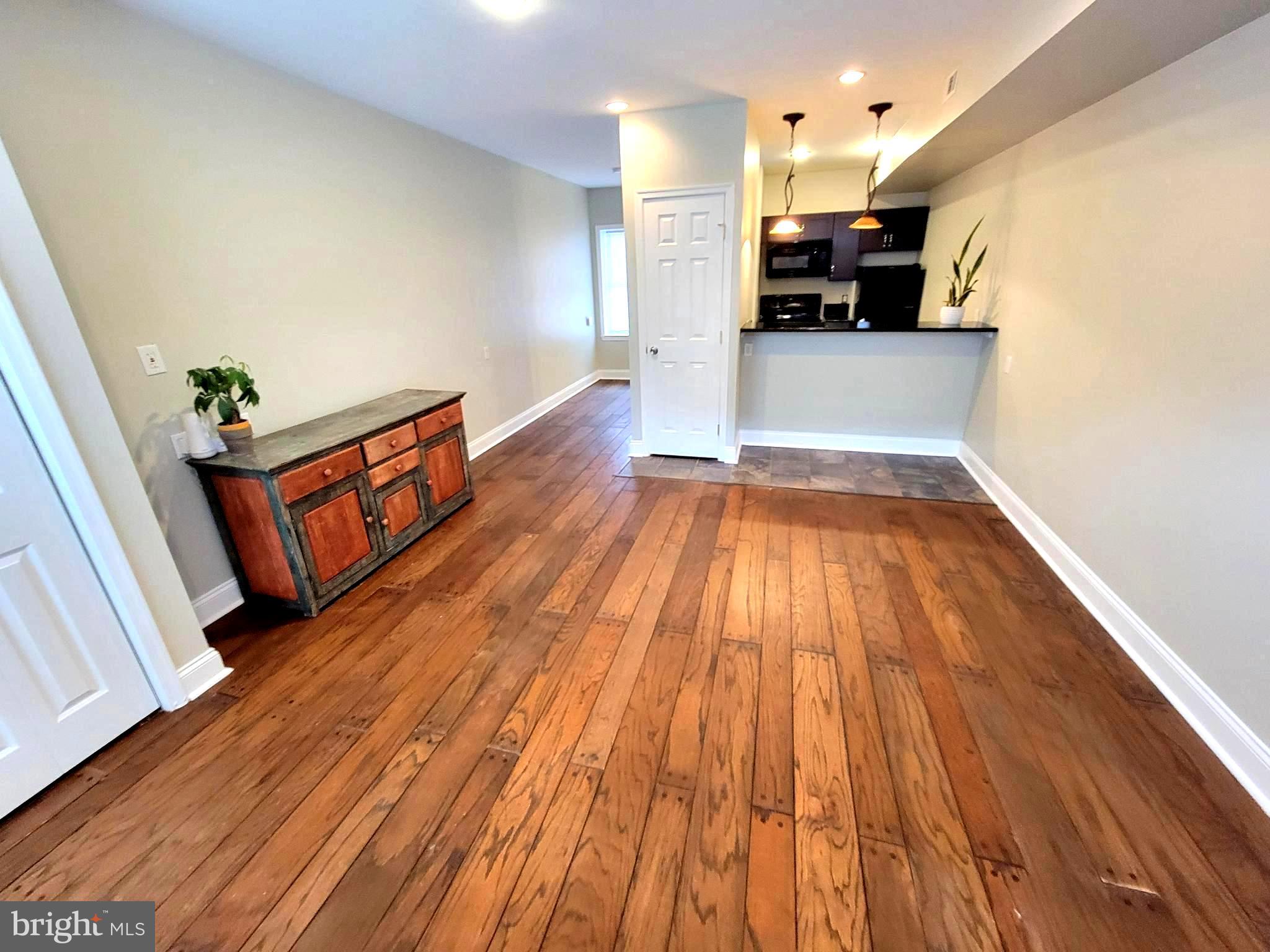 Note! your water and Wi Fi are included in your rent.  This apartment has just been repainted and refreshed. This 1 bedroom recently renovated 1st floor apartment is located in the Fells Point Historic District . It is part of a 2 unit building with the owners unit situated on the second and third levels. It is currently available for occupancy. Availability is timed to coincide with the Johns Hopkins, Medical Complex associate turnover period. It is conveniently situated on the Johns Hopkins Shuttle route. It includes use of a small yard. The pedestrian waterfront walkway leading to Canton, Harbor Point, Harbor East and Downtown is just 1 block from home while all of this Historic Seaport's many charms are just outside your doorway. Water and WIFI are included. Owner requires potential tenants to have a credit score of  700 or better. Note!  listing agent must accompany. Please allow for a 24 hour window, to show.
