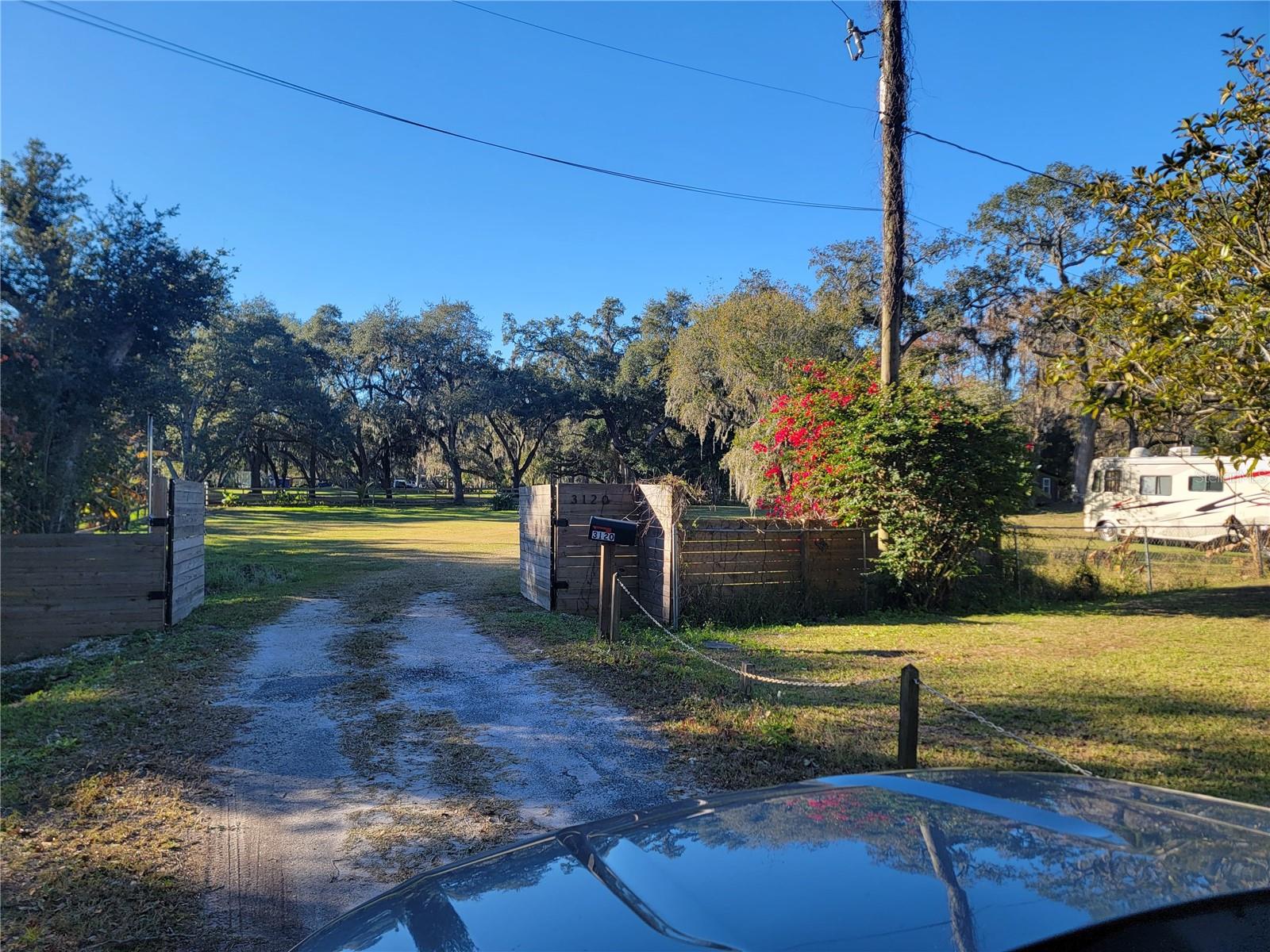 PAY ATTENTION!!!!!!!! Builders & Discerning Investors,Presenting a rare and private 1.25-acre waterfront estate parcel featuring 200 feet of pristine creek frontage with direct access to East Lake Tohopekaliga. Tucked away in a serene setting, this property offers an exceptional blend of seclusion, natural beauty, and convenience. Enjoy refined country-style living while being just minutes from the airport and Lake Nona’s renowned medical and innovation district.With ample space to accommodate RV storage, boats, equestrian use, and hobby farming, this versatile property invites you to design and build a custom luxury residence tailored to your lifestyle. Located in a rapidly appreciating area, this is a premier opportunity to secure land in one of Central Florida’s most desirable growth corridors.